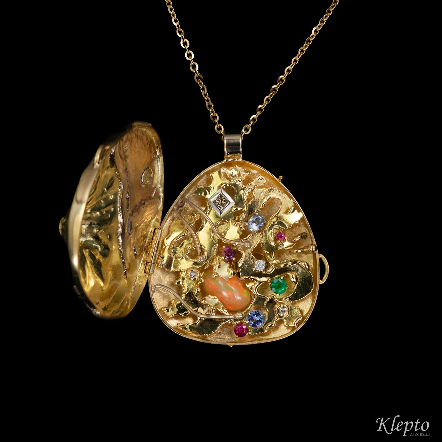 "Micromondo" sculpture gold pendant with precious stones and hidden treasure