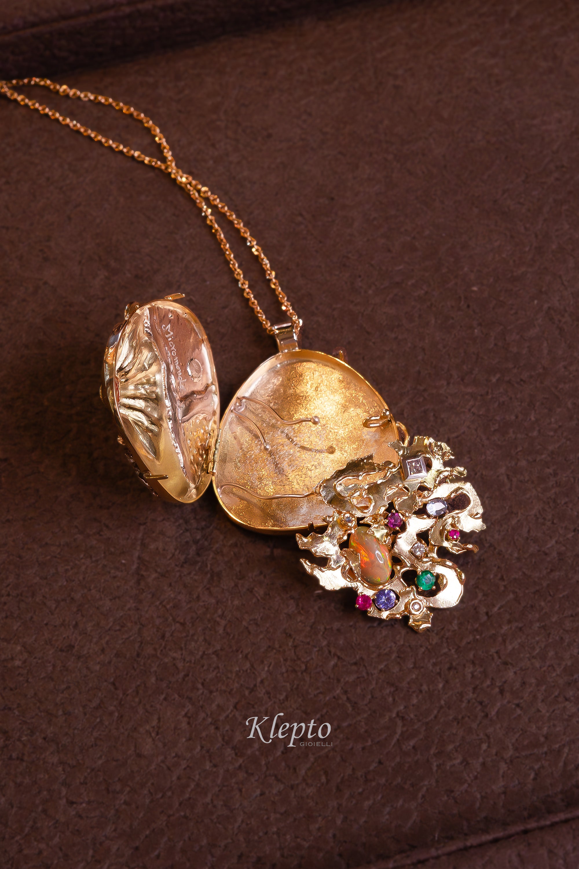 "Micromondo" sculpture gold pendant with precious stones and hidden treasure