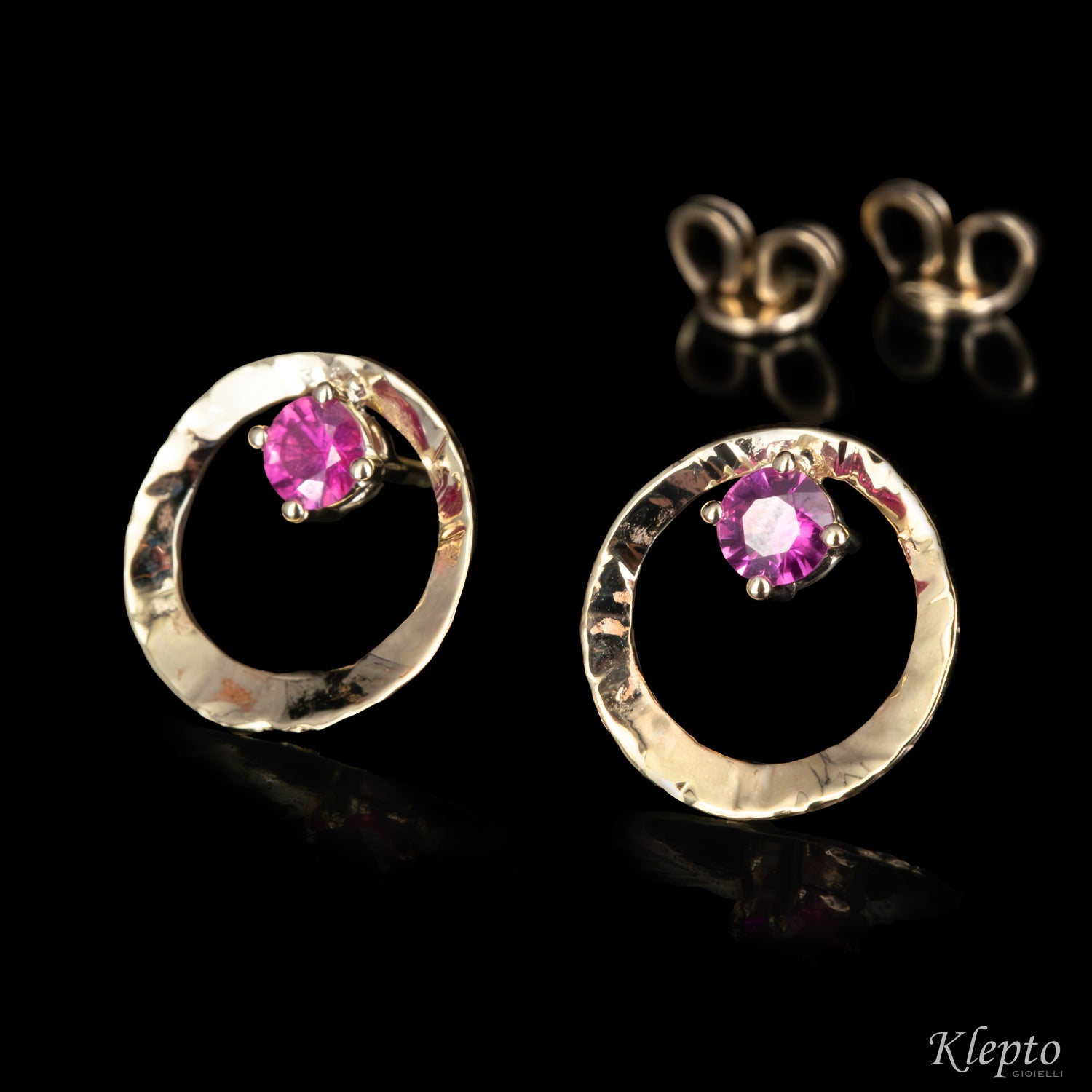 Natural white gold earrings "Pulsar" with Rubies