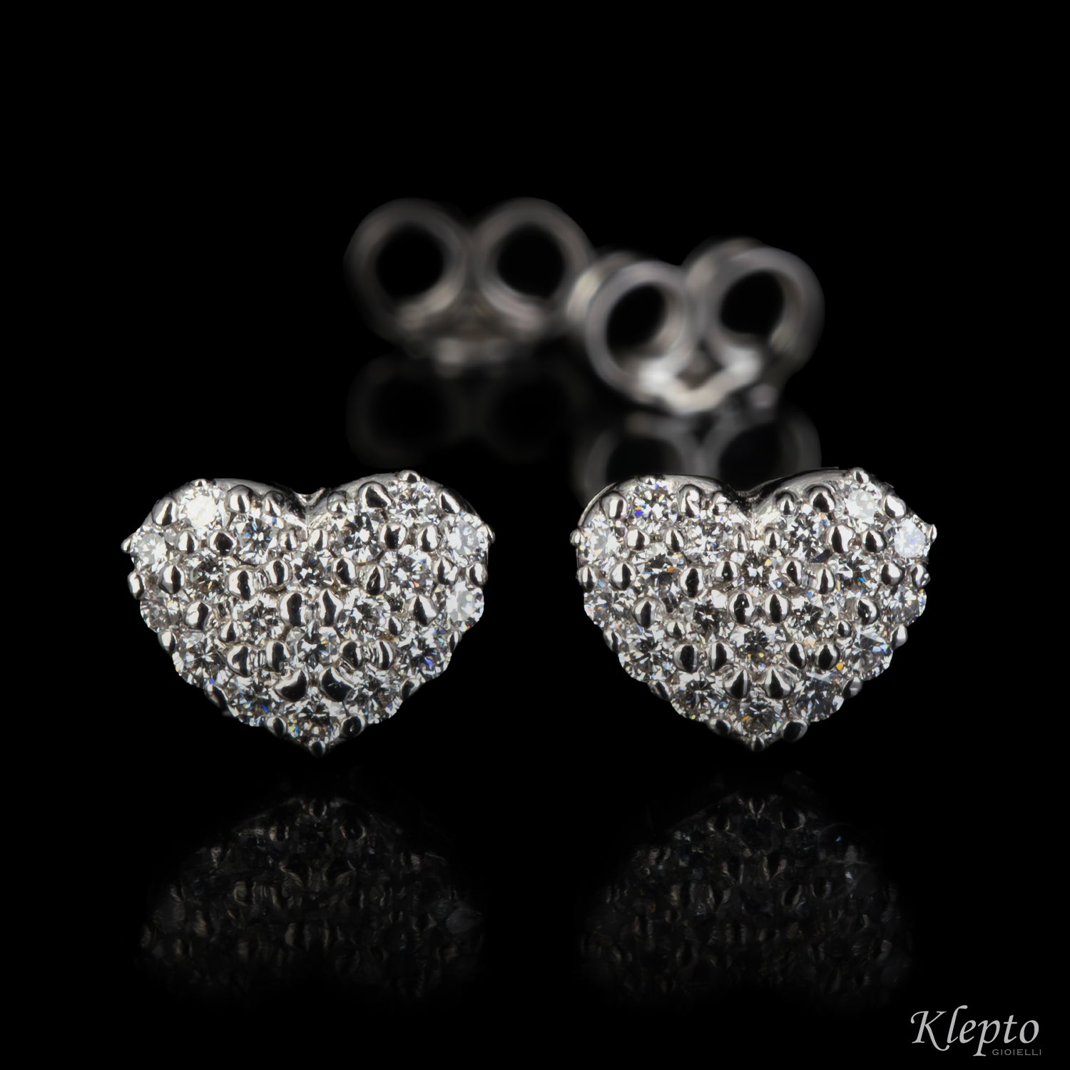 White gold heart earrings with diamonds