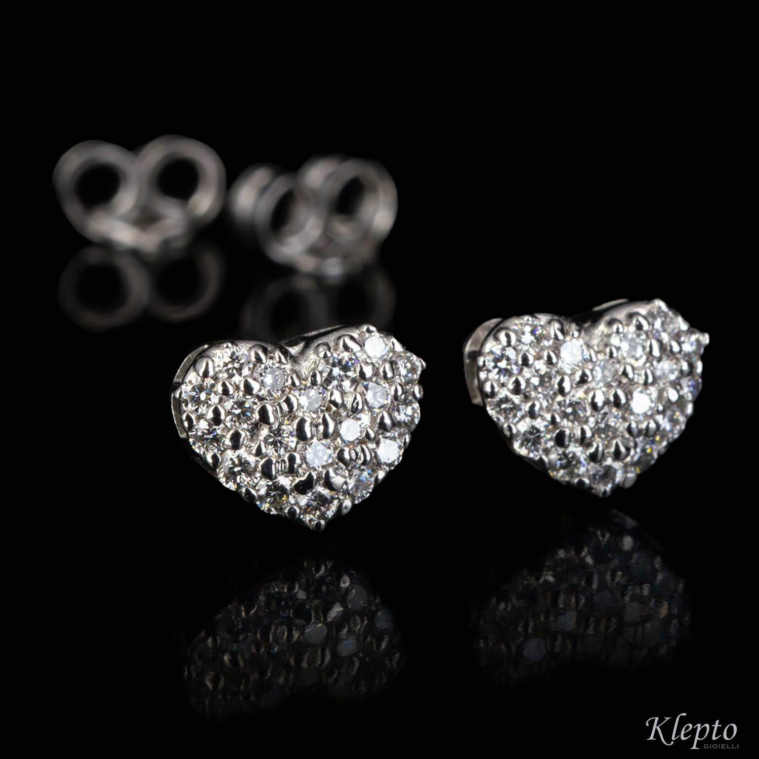 White gold heart earrings with diamonds