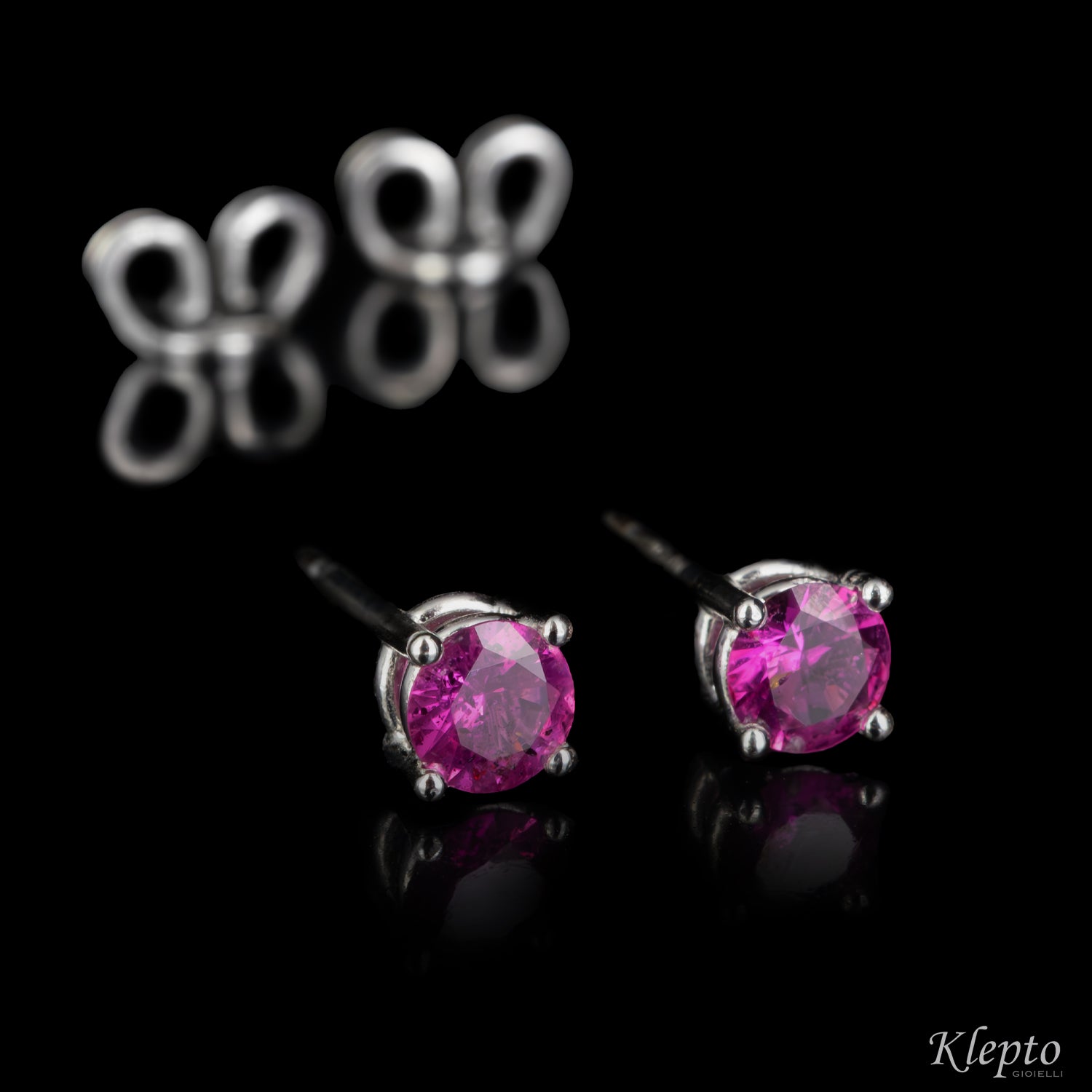 White gold earrings with rubies