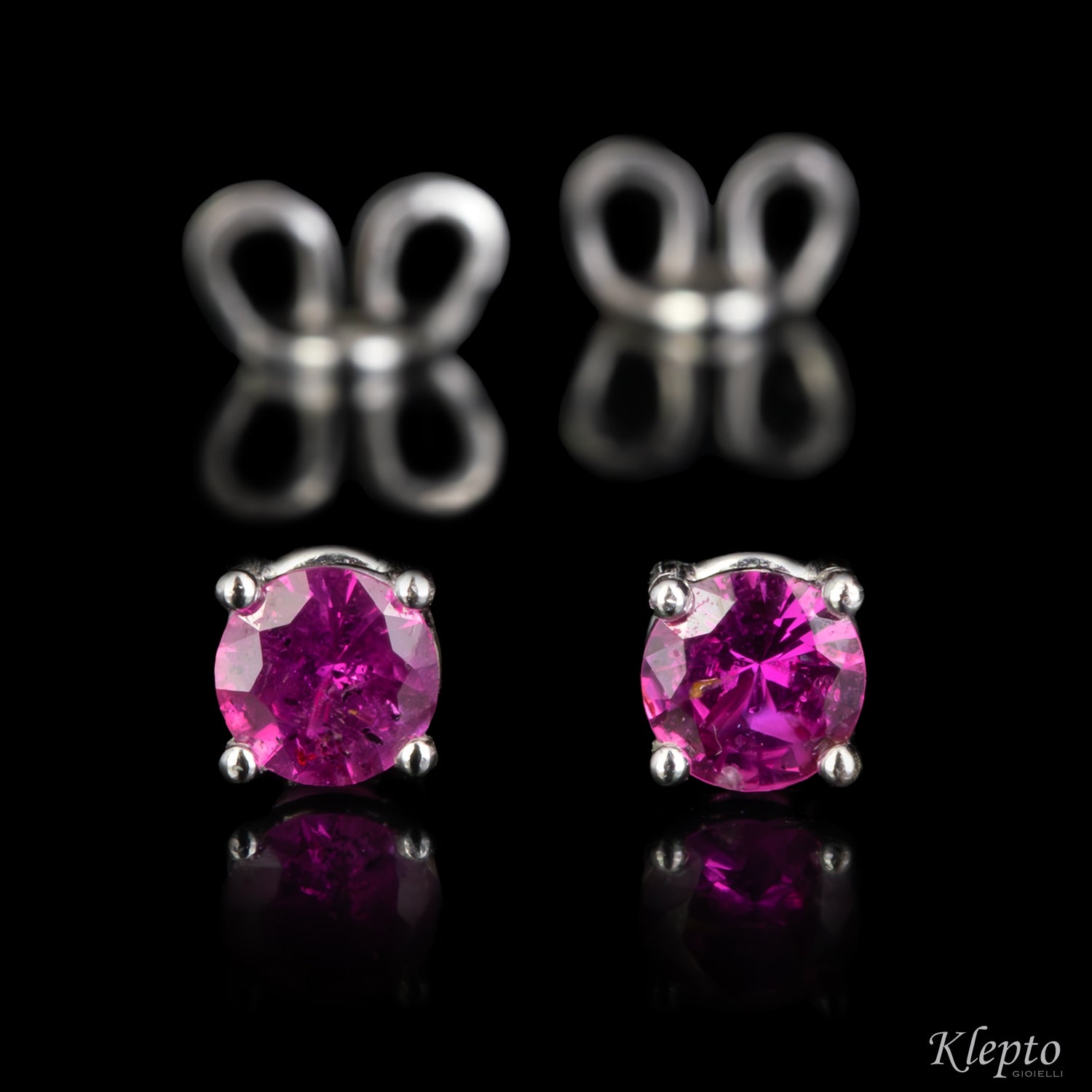 White gold earrings with rubies
