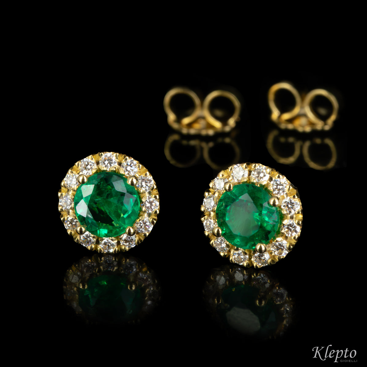 Yellow gold earrings with emeralds and diamonds