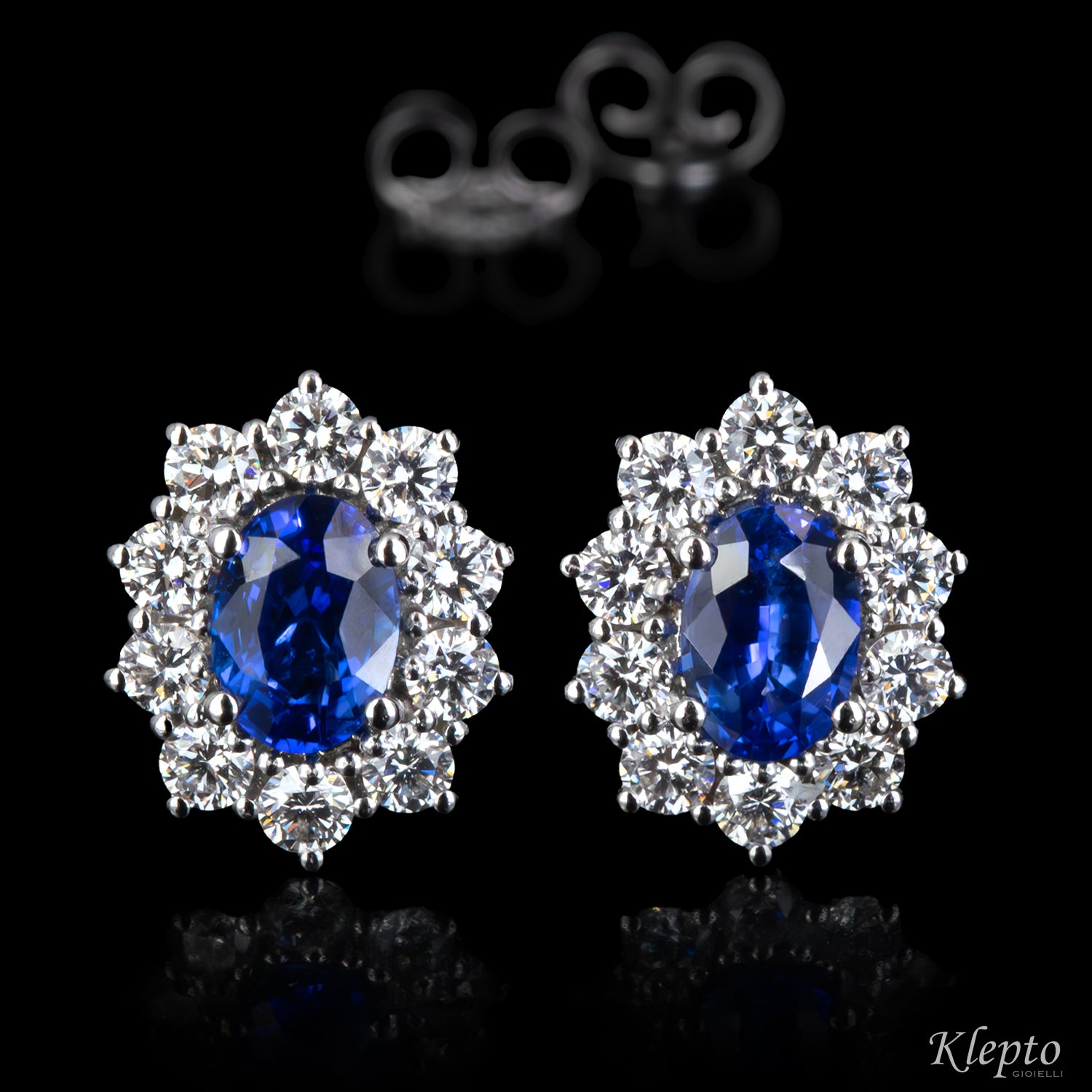 White gold stud earrings with blue sapphires and diamonds