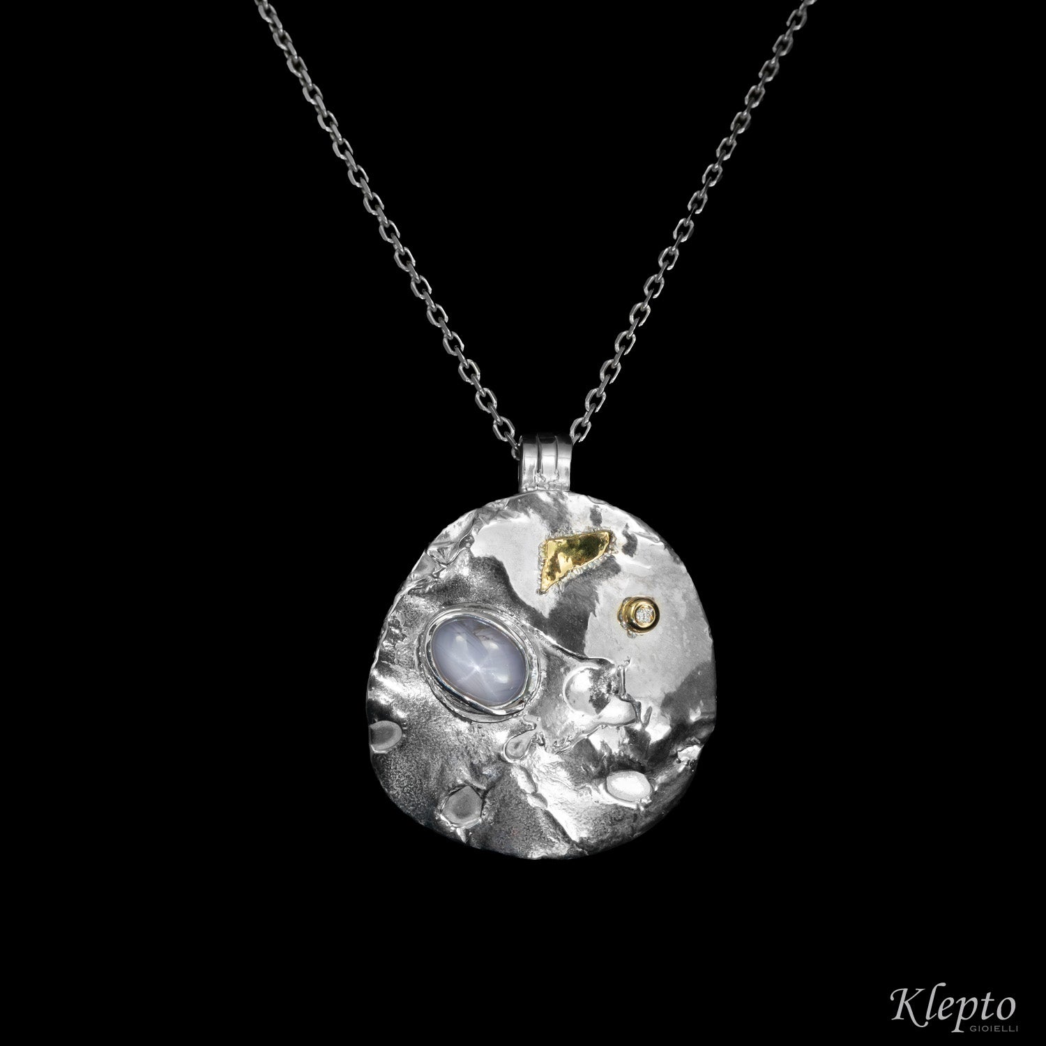 "Supernova" Silnova® Silver Pendant with Asteria Sapphire, Diamond and yellow gold details