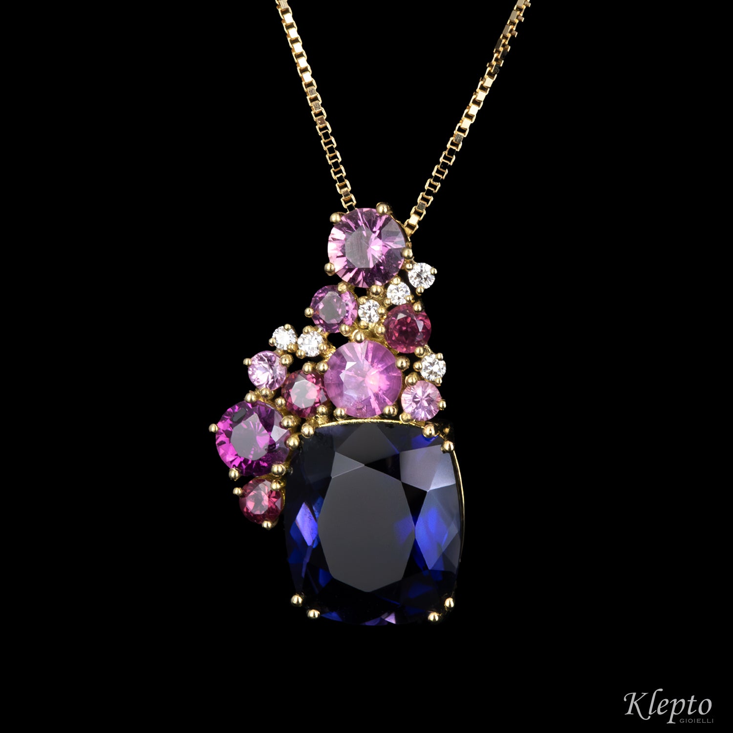 Yellow gold pendant with Iolite, Pink Sapphires, Rhodolites, and Diamonds