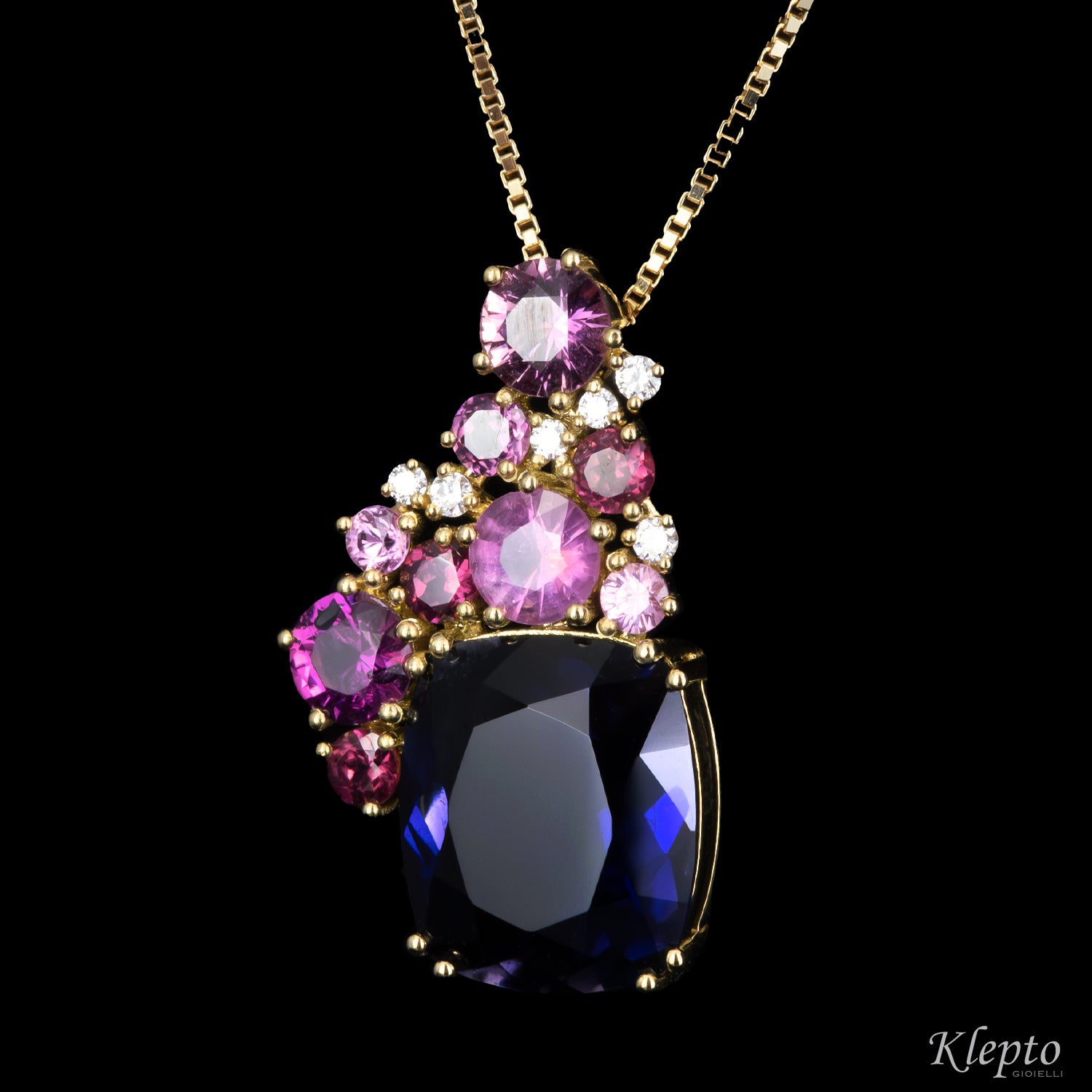Yellow gold pendant with Iolite, Pink Sapphires, Rhodolites, and Diamonds