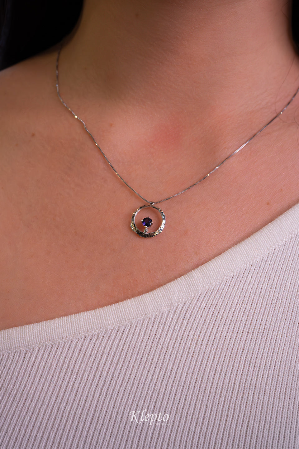 "Pulsar" white gold pendant with purple Sapphire