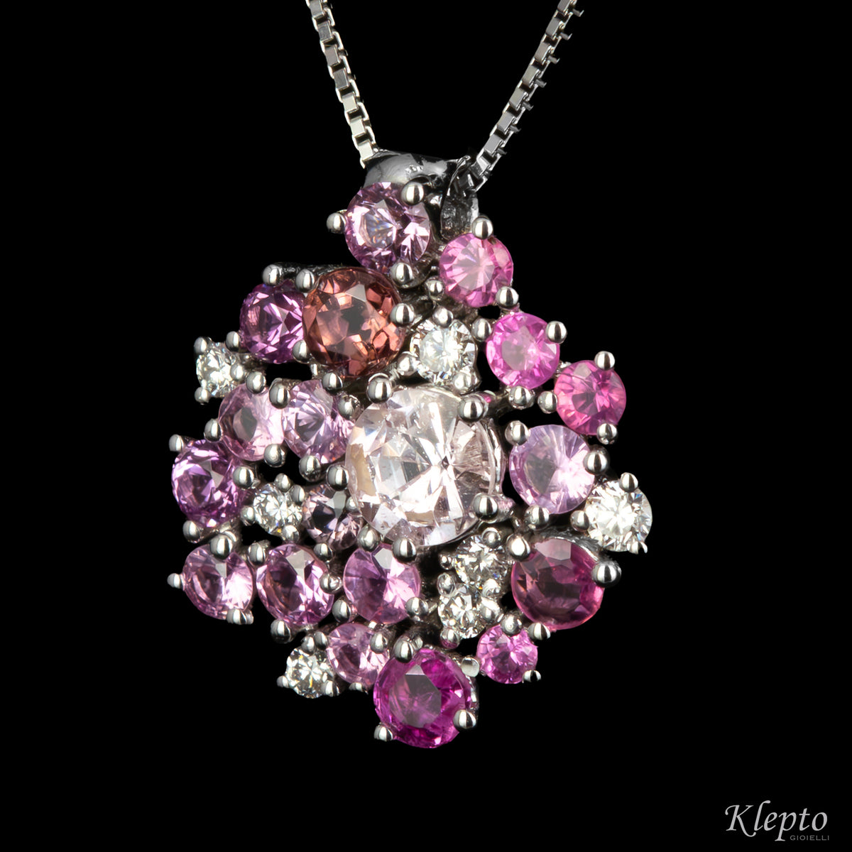 White gold pendant with pink sapphires, rhodolites and diamonds
