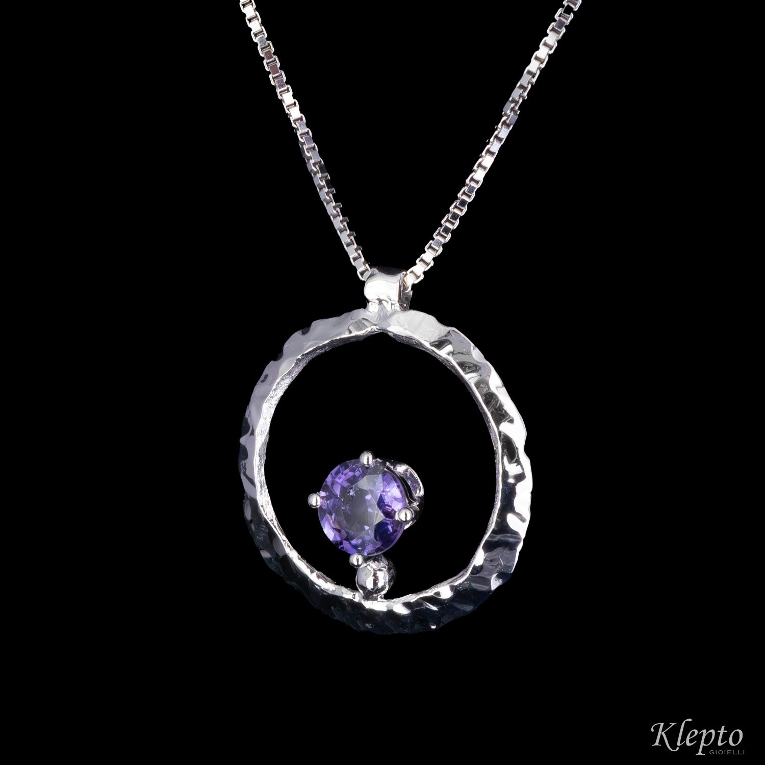 "Pulsar" white gold pendant with purple Sapphire