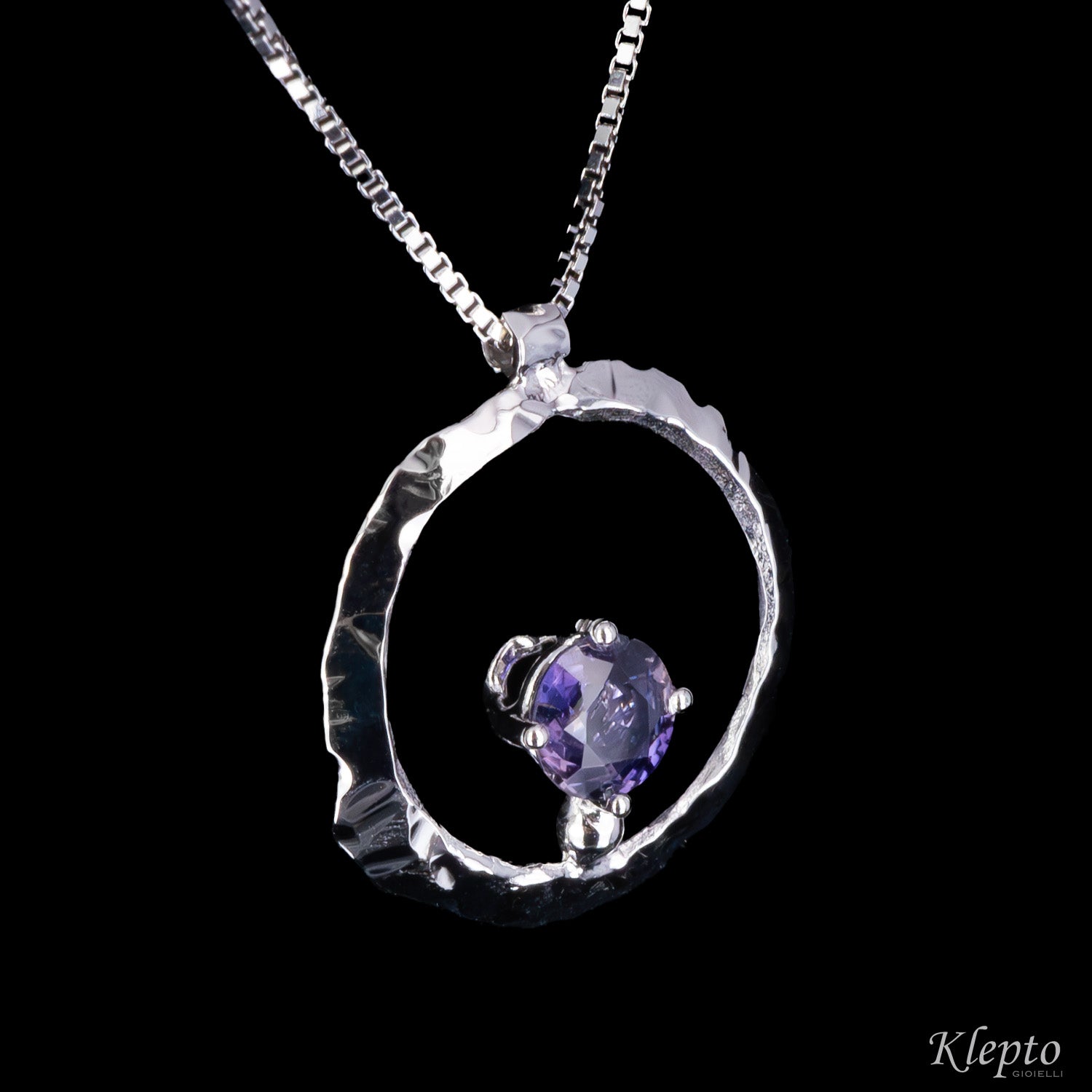 "Pulsar" white gold pendant with purple Sapphire