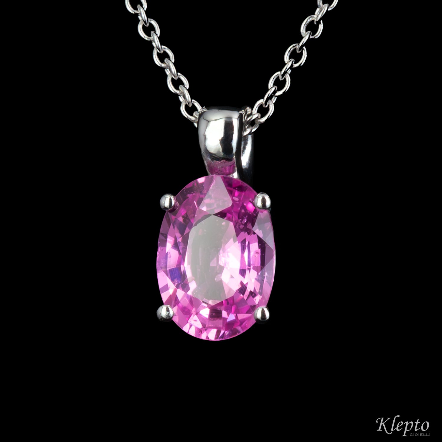 White gold pendant with pink sapphire