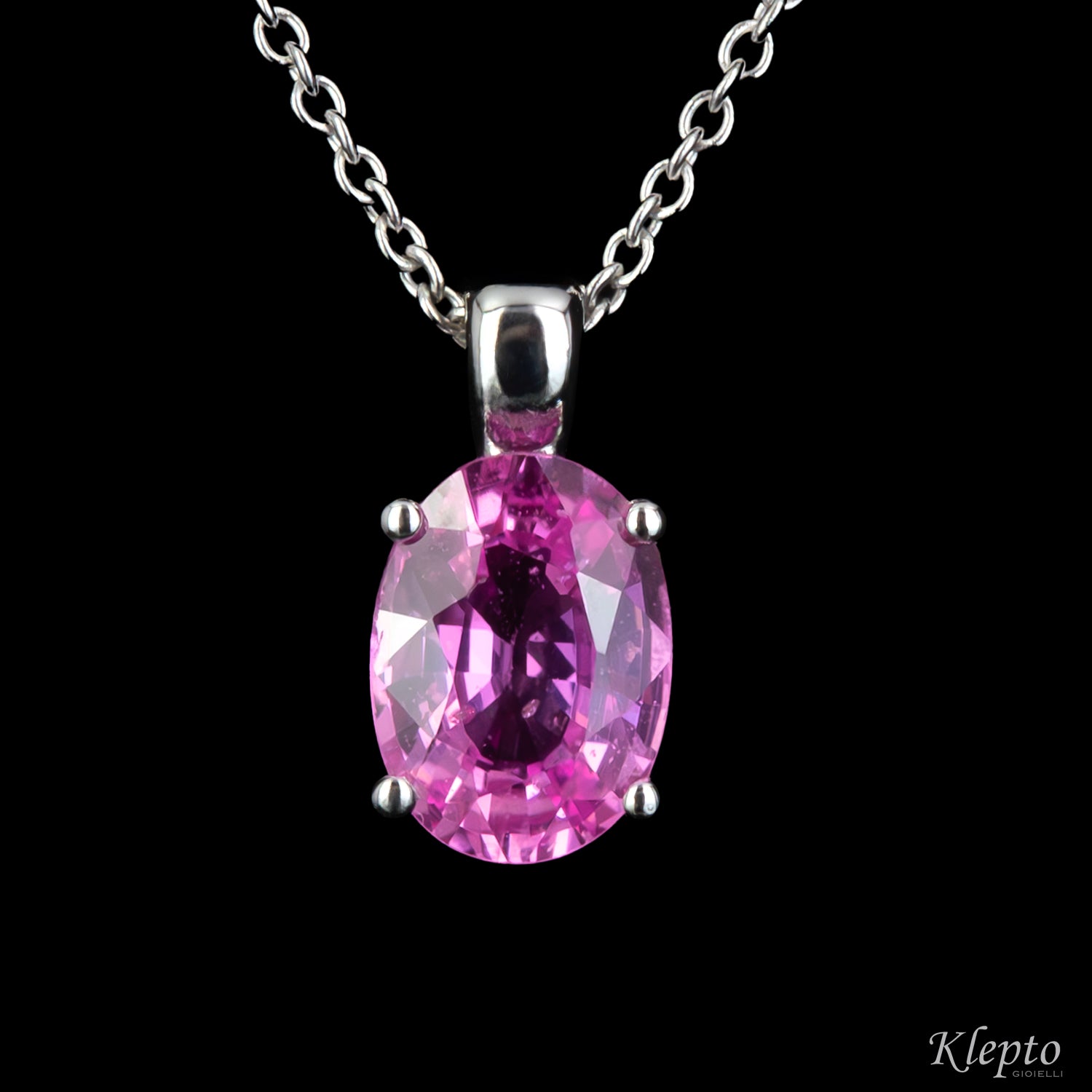 White gold pendant with pink sapphire