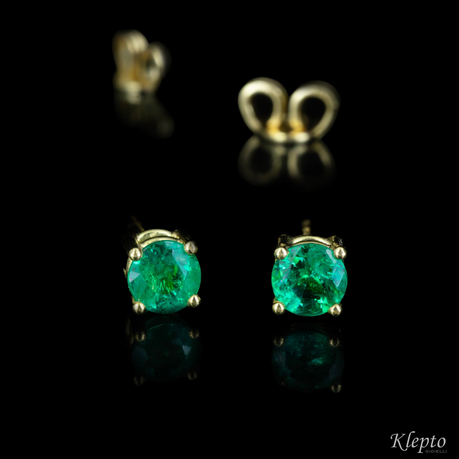 Yellow gold earrings with emeralds