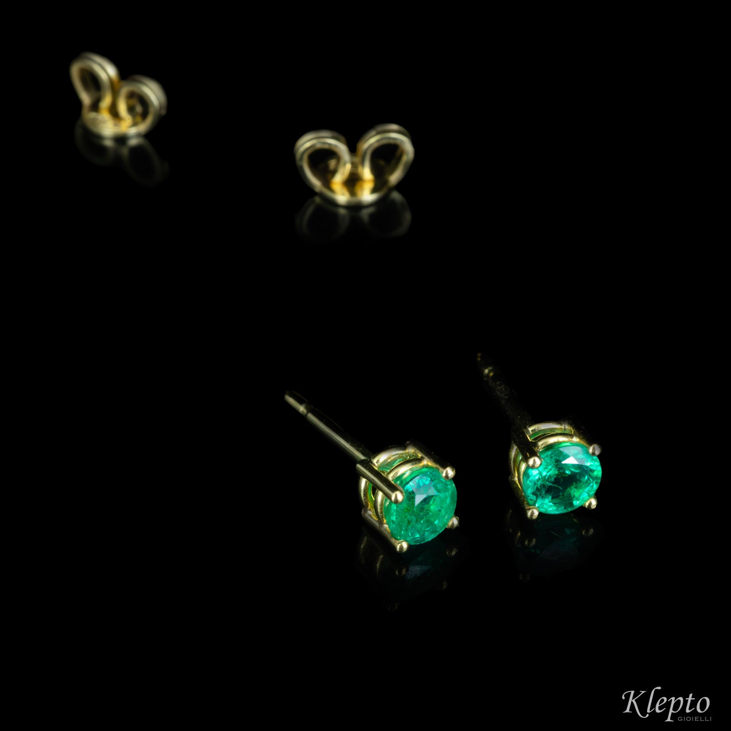 Yellow gold earrings with emeralds