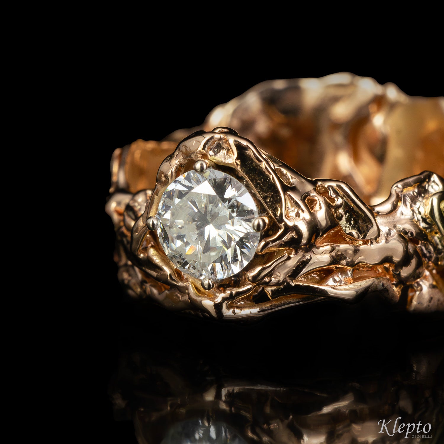 Solitaire in flame-fused rose gold with diamond