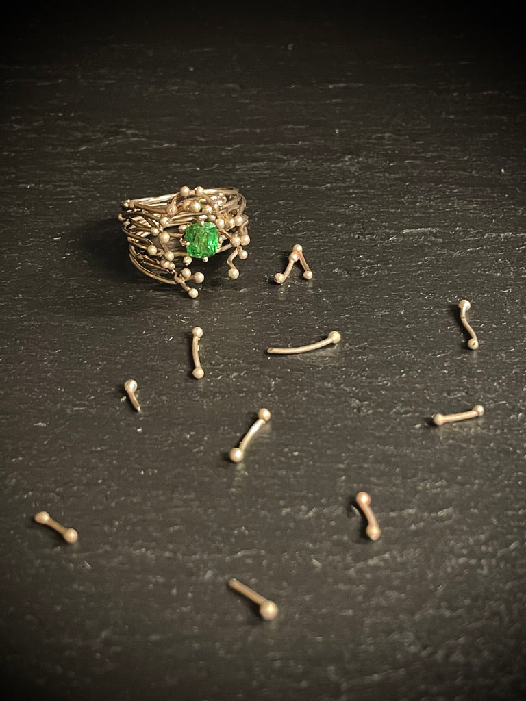 White gold ring with Tzavorite and "Bollicine" Diamonds