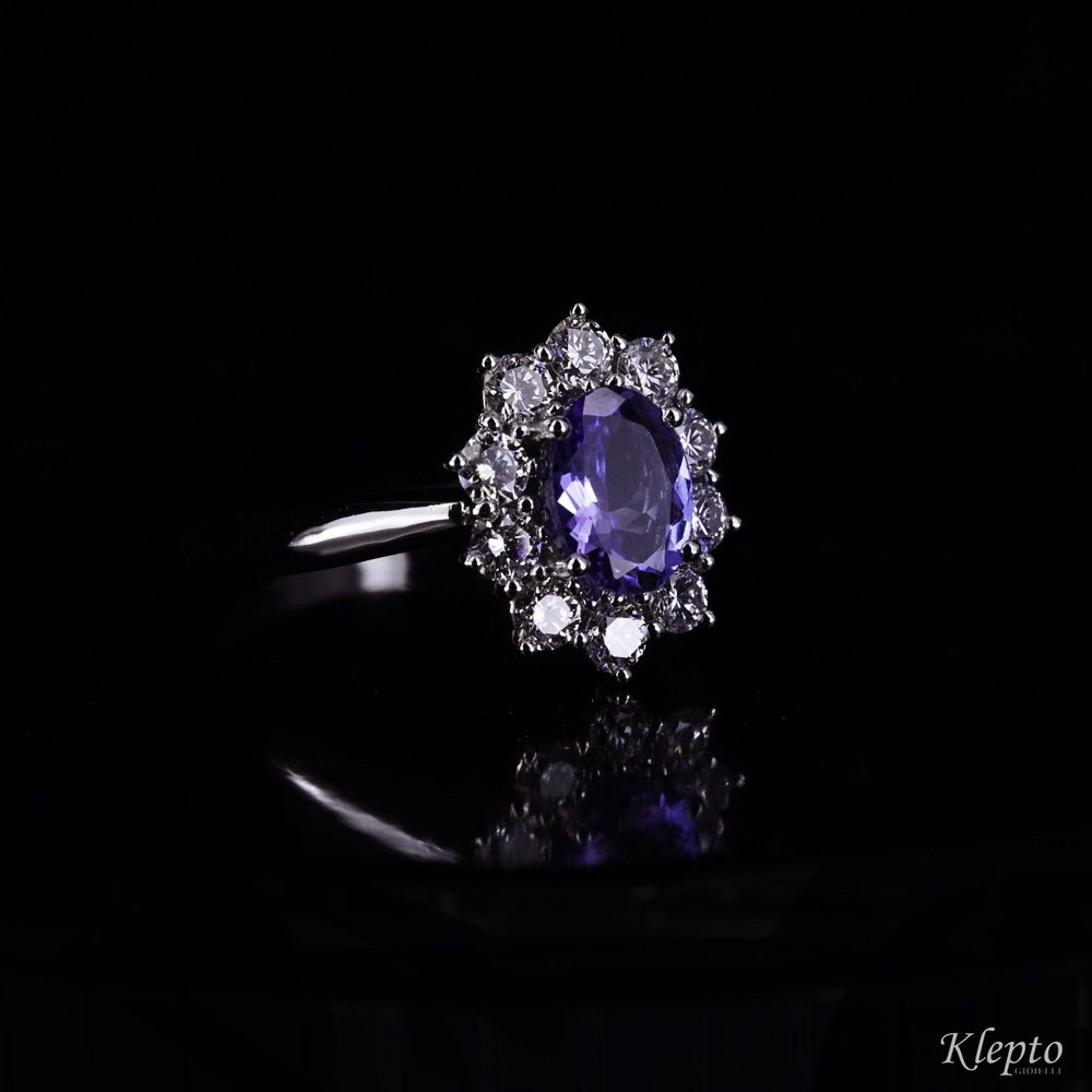 Classic white gold ring with Tanzanite and diamond surround