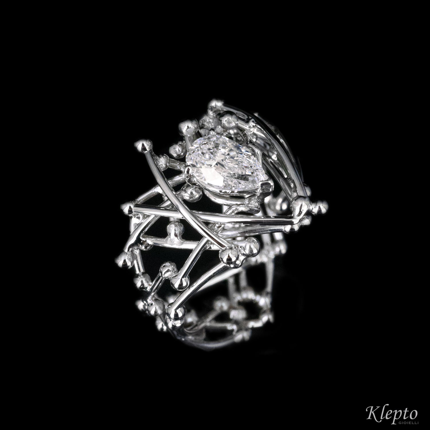 White gold solitaire with teardrop diamond