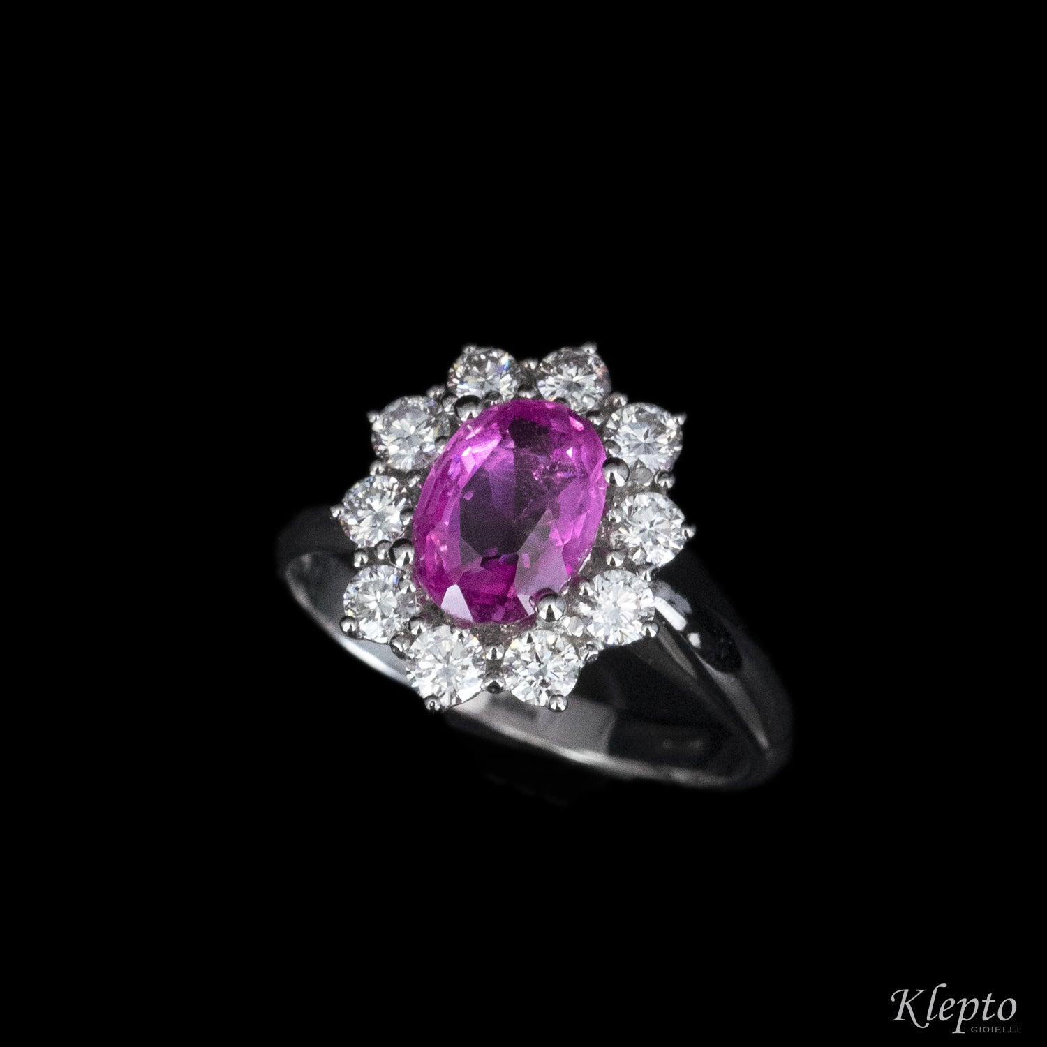 Classic ring in white gold with pink Sapphire and outline of Diamonds