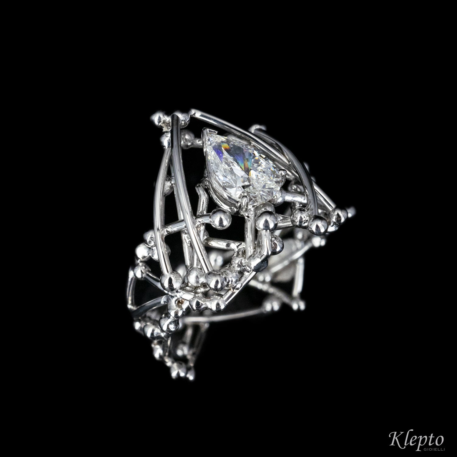 White gold solitaire with teardrop diamond