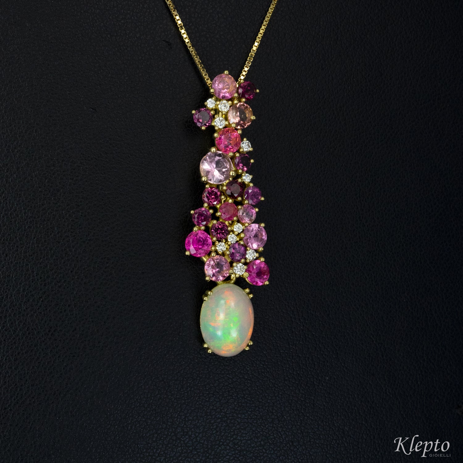 Yellow gold pendant with Tourmalines, Rhodolites, Opal and Diamonds.