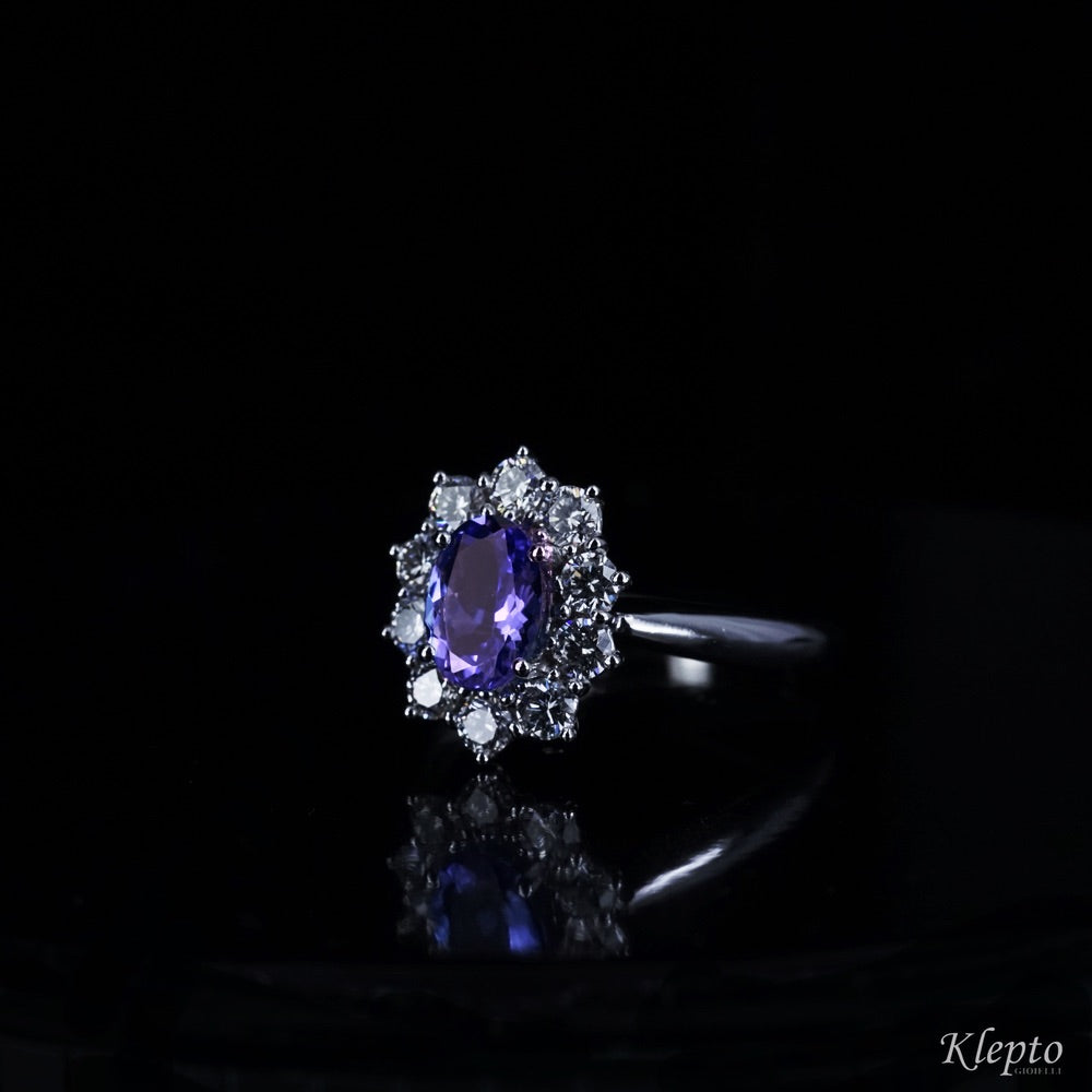 Classic white gold ring with Tanzanite and diamond surround