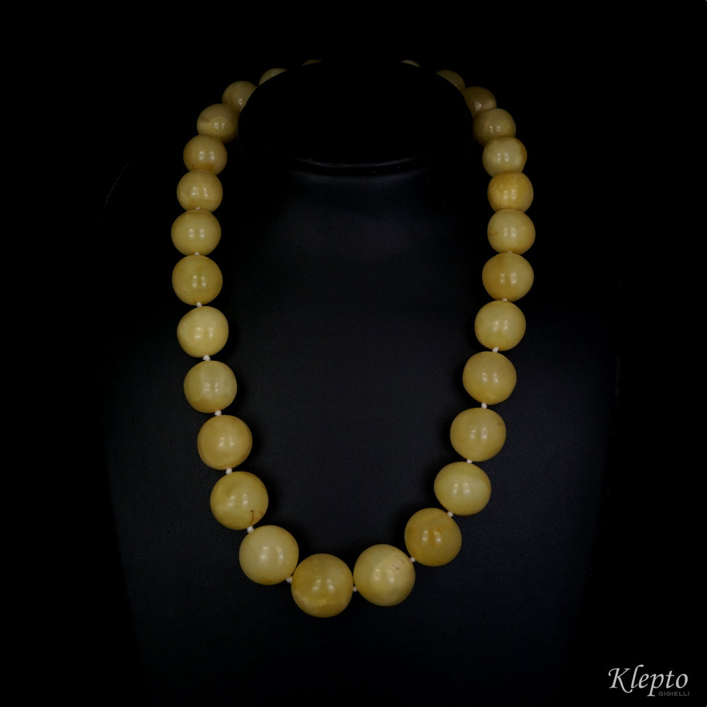 Long gold necklace with Baltic amber