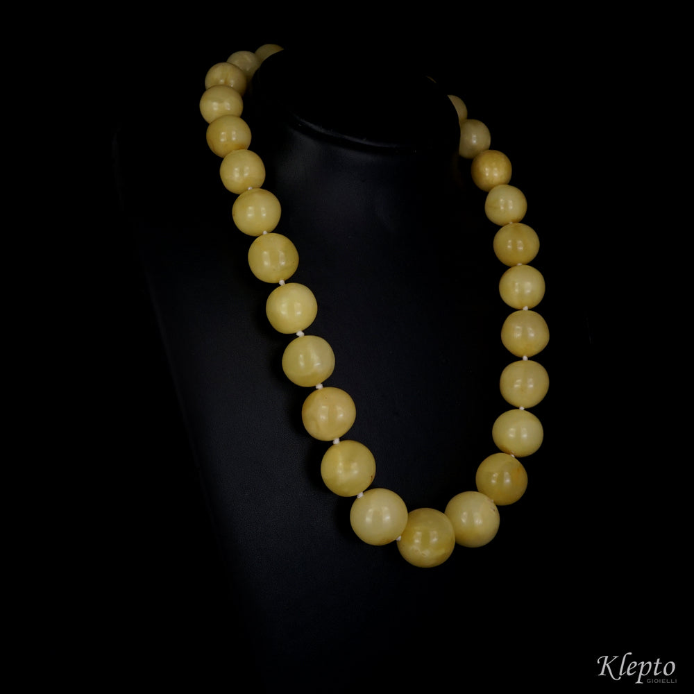 Long gold necklace with Baltic amber