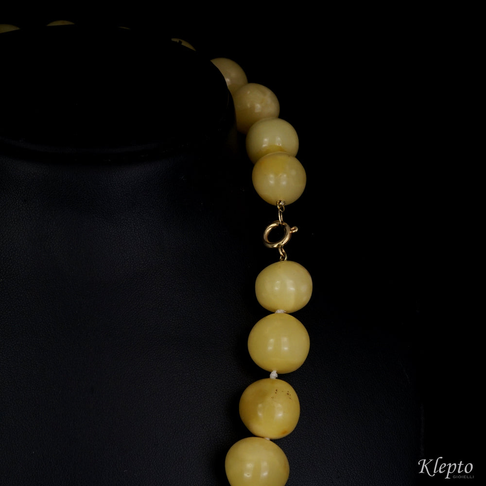 Long gold necklace with Baltic amber