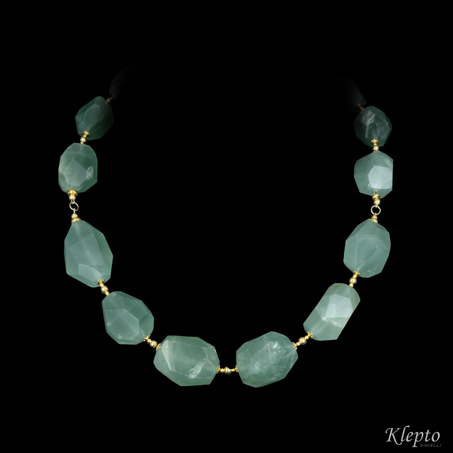 Yellow gold necklace with rough aquamarine