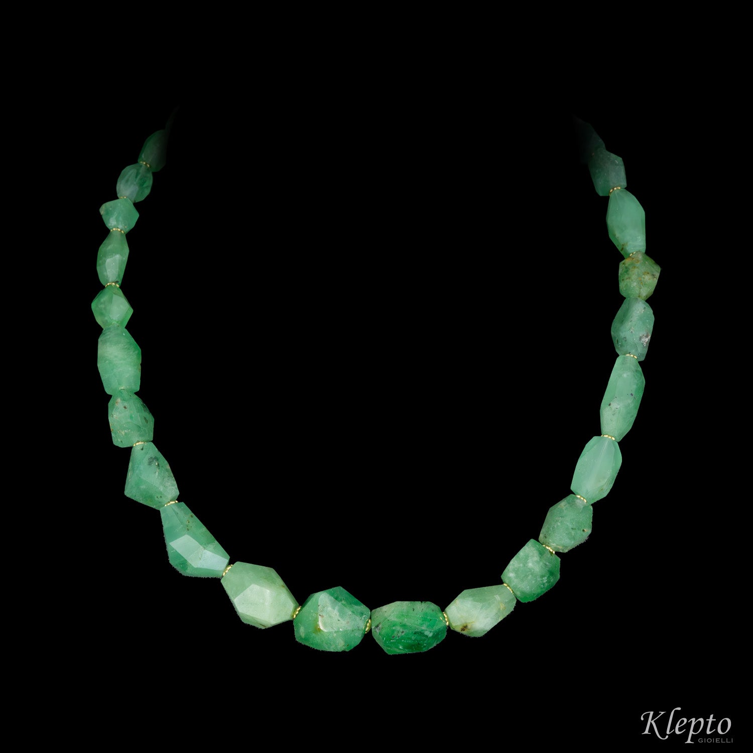 Yellow gold necklace with raw emeralds