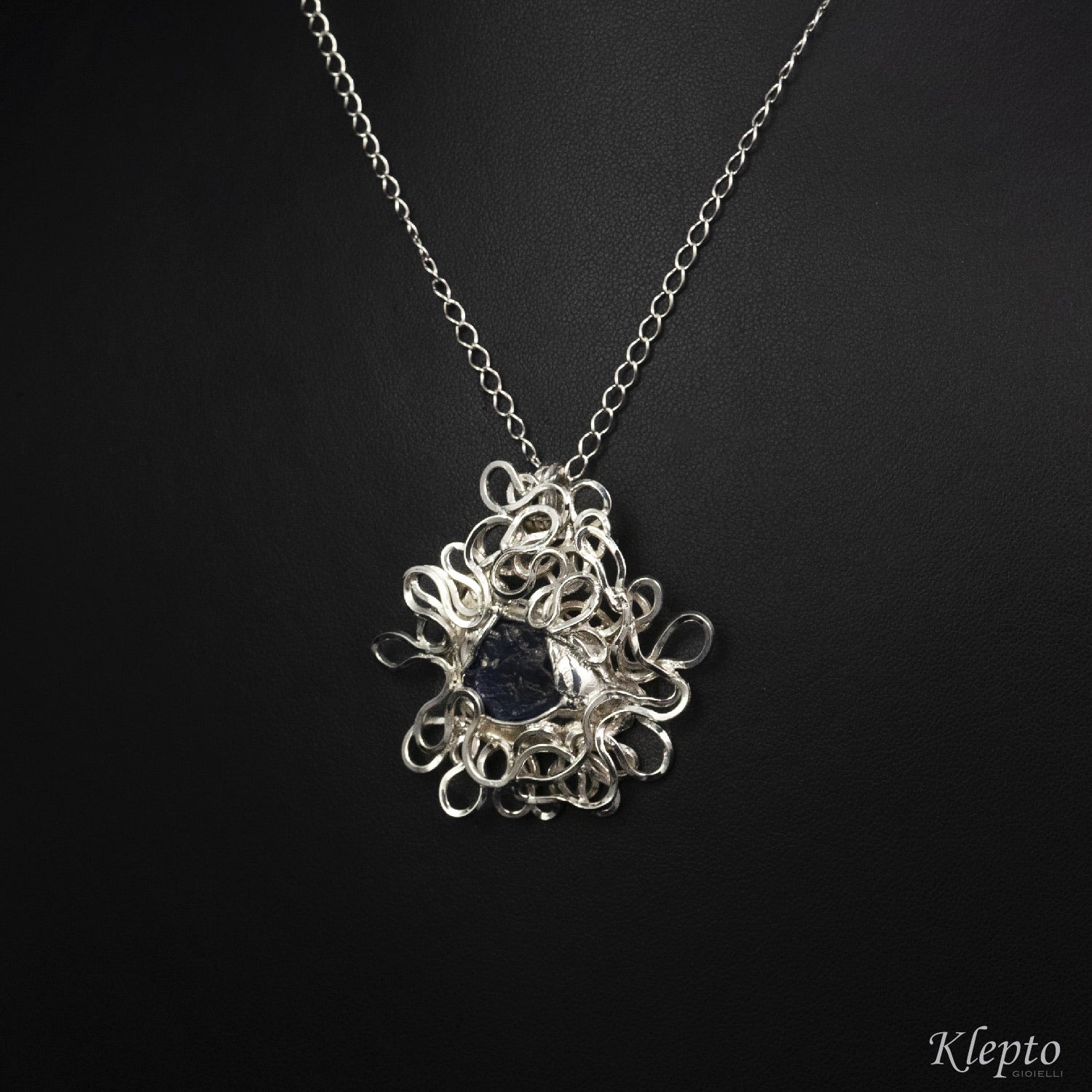 Pendant in Silnova® Silver flush with raw Sapphire
