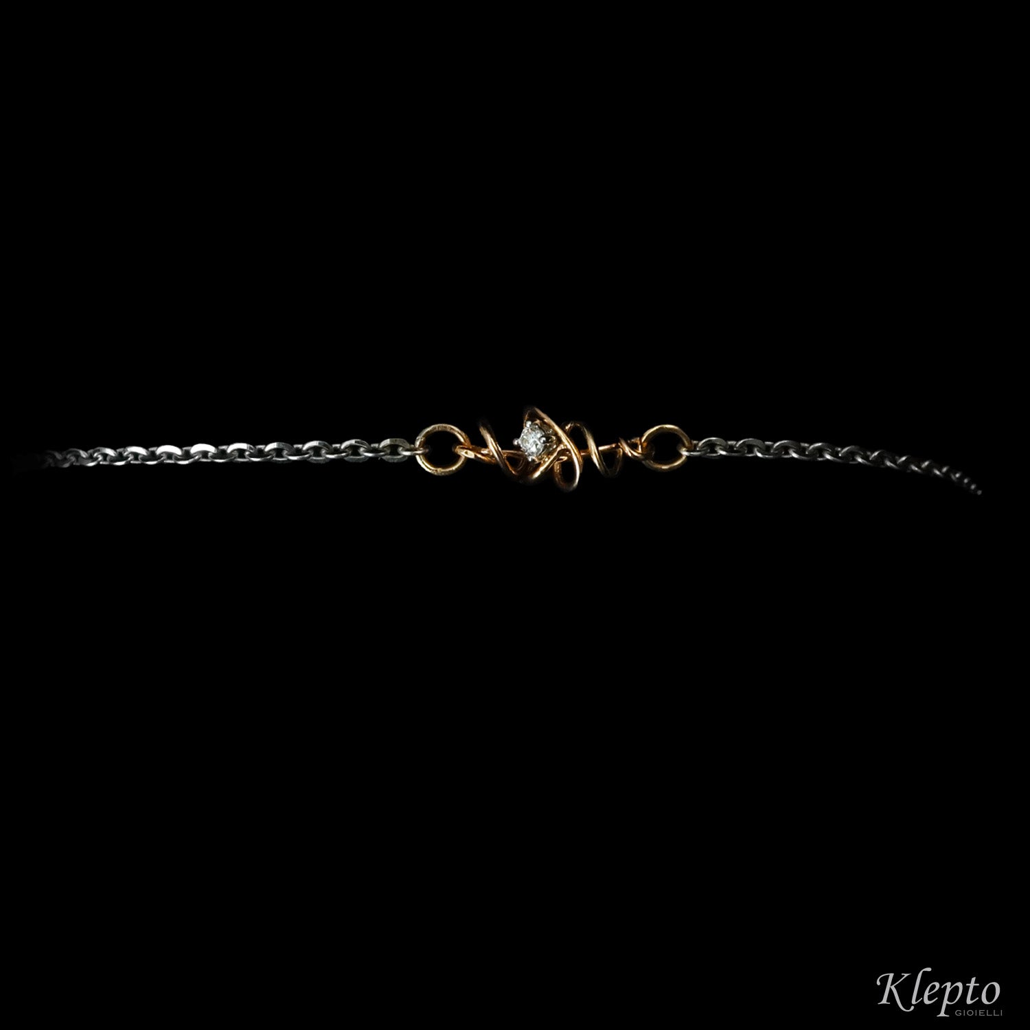 White gold bracelet with Diamond and rose gold knot