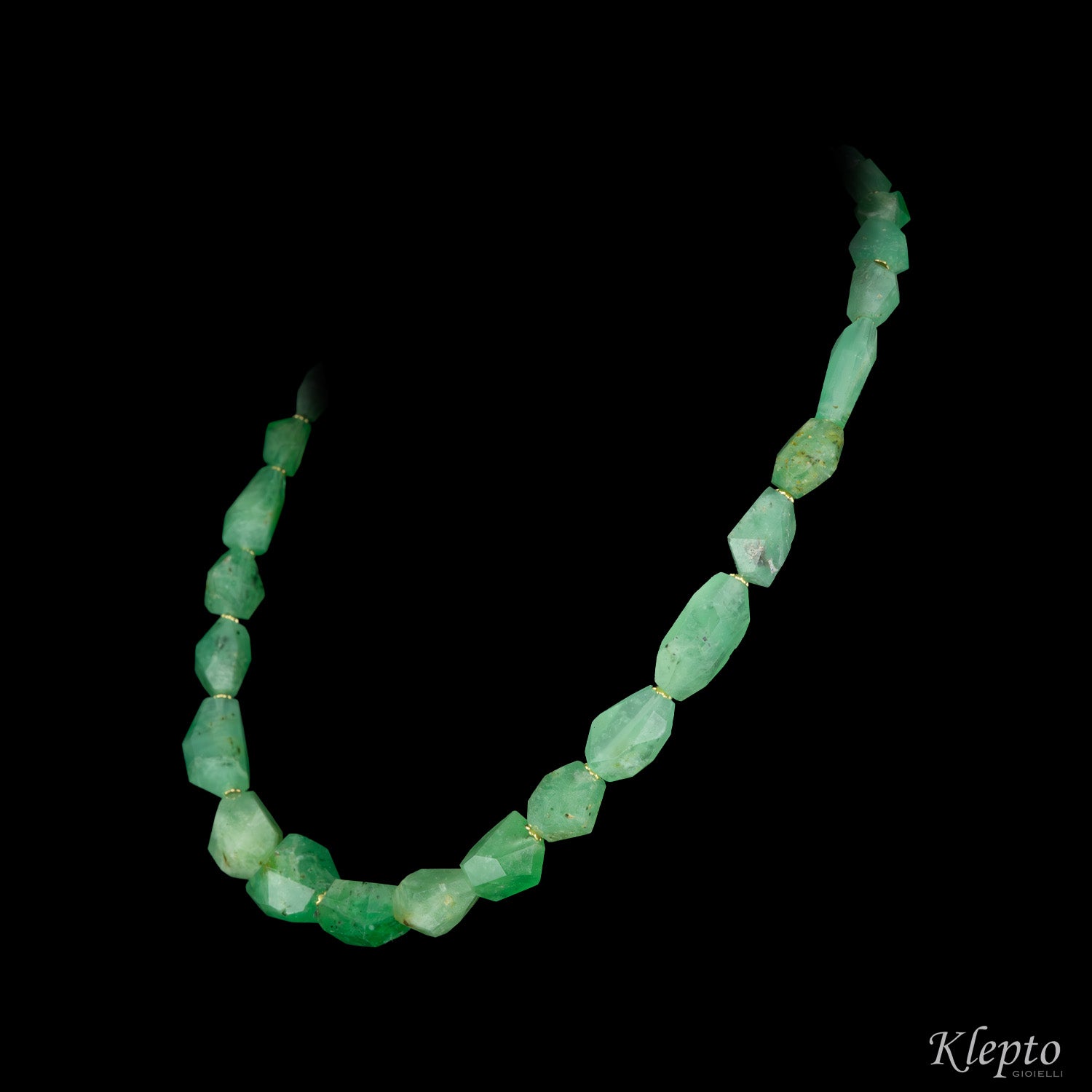 Yellow gold necklace with raw emeralds