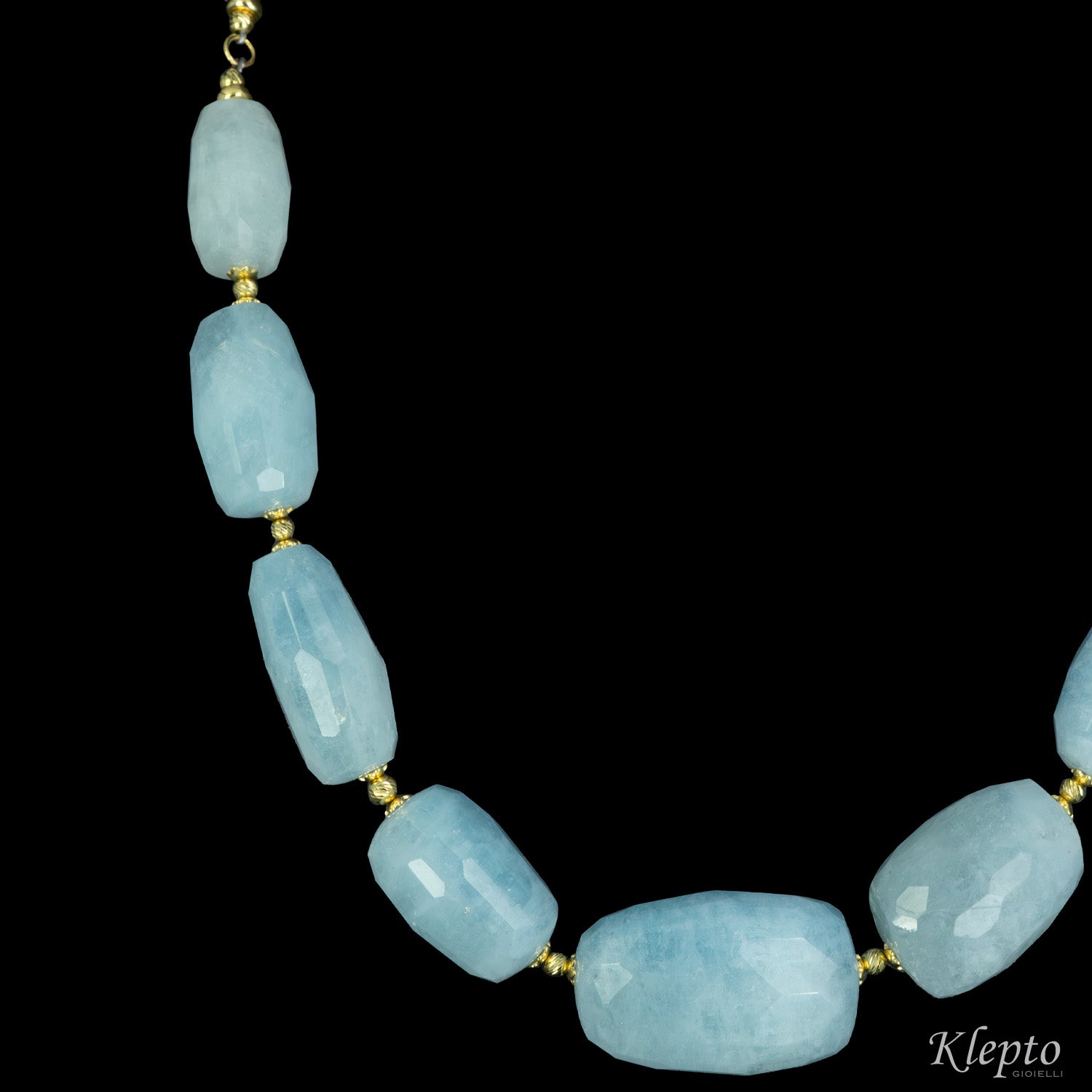 Yellow gold necklace with rough aquamarine