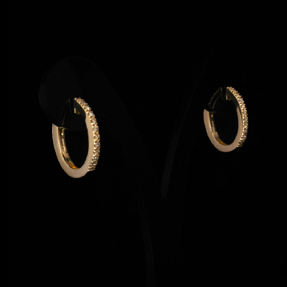 Rose gold hoop earrings with brown diamonds