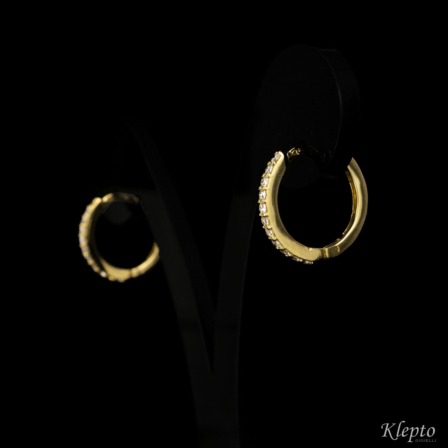 Yellow gold hoop earrings with diamonds