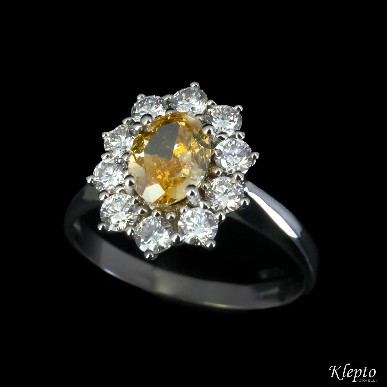 Classic white gold ring with Fancy Diamond and diamond surround