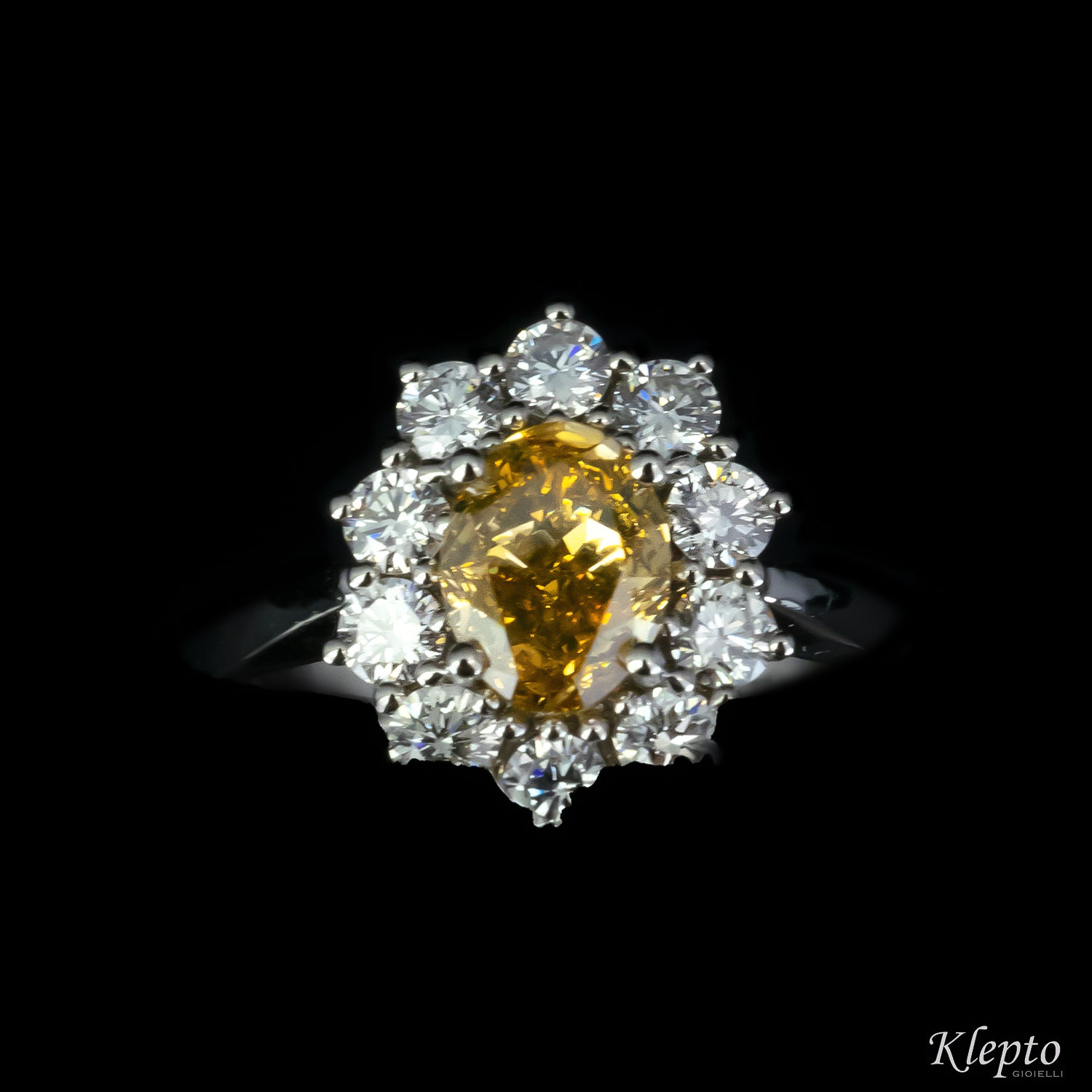 Classic white gold ring with Fancy Diamond and diamond surround