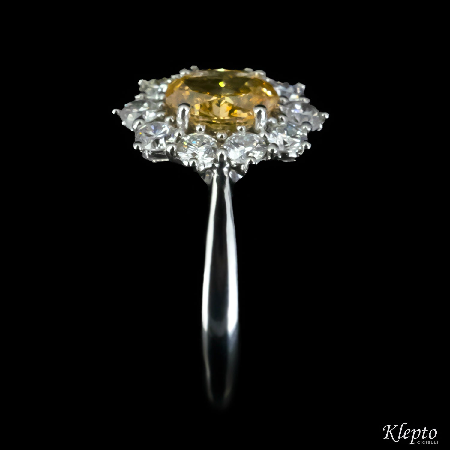 Classic white gold ring with Fancy Diamond and diamond surround