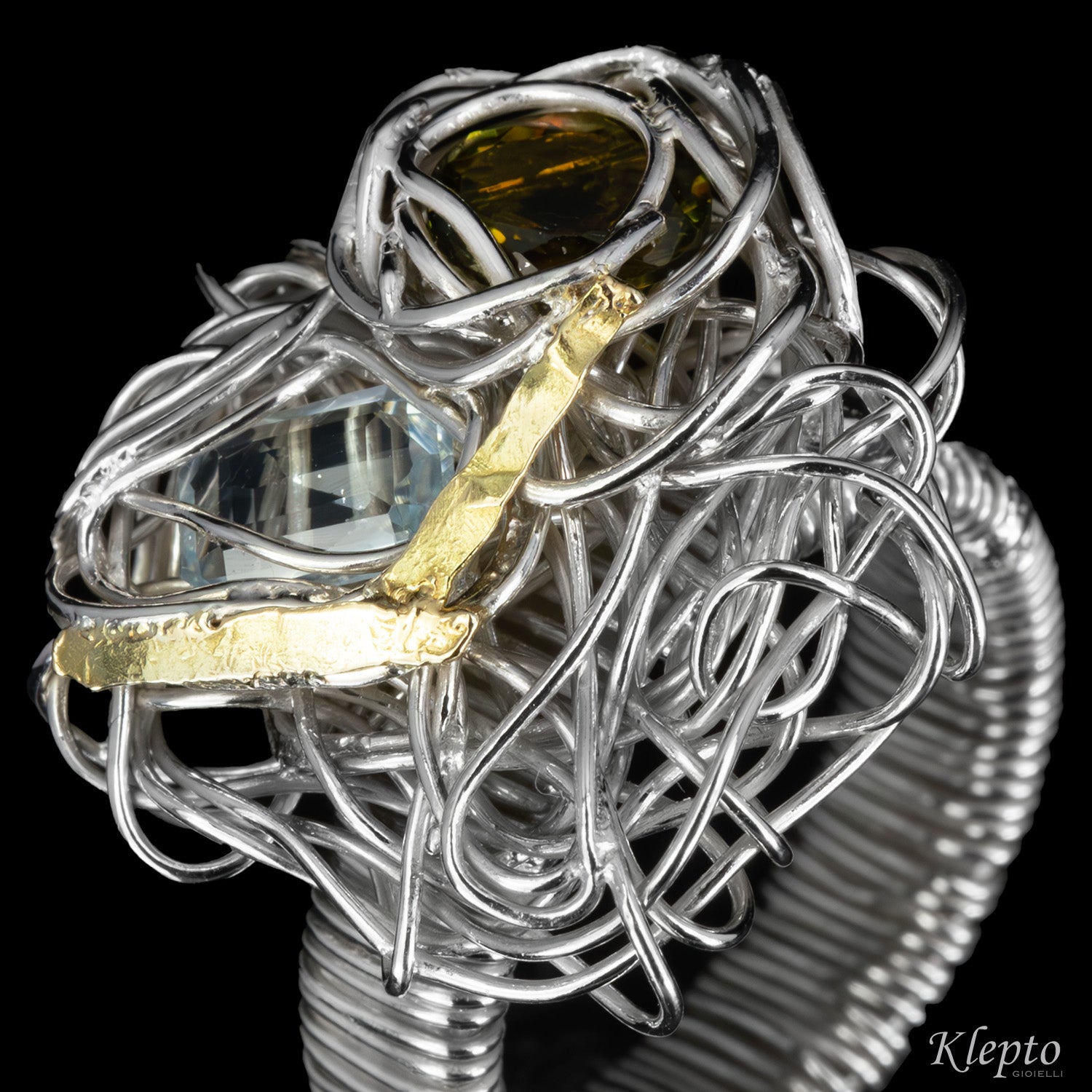 Silnova® silver wire ring with green tourmaline, aquamarine and yellow gold details