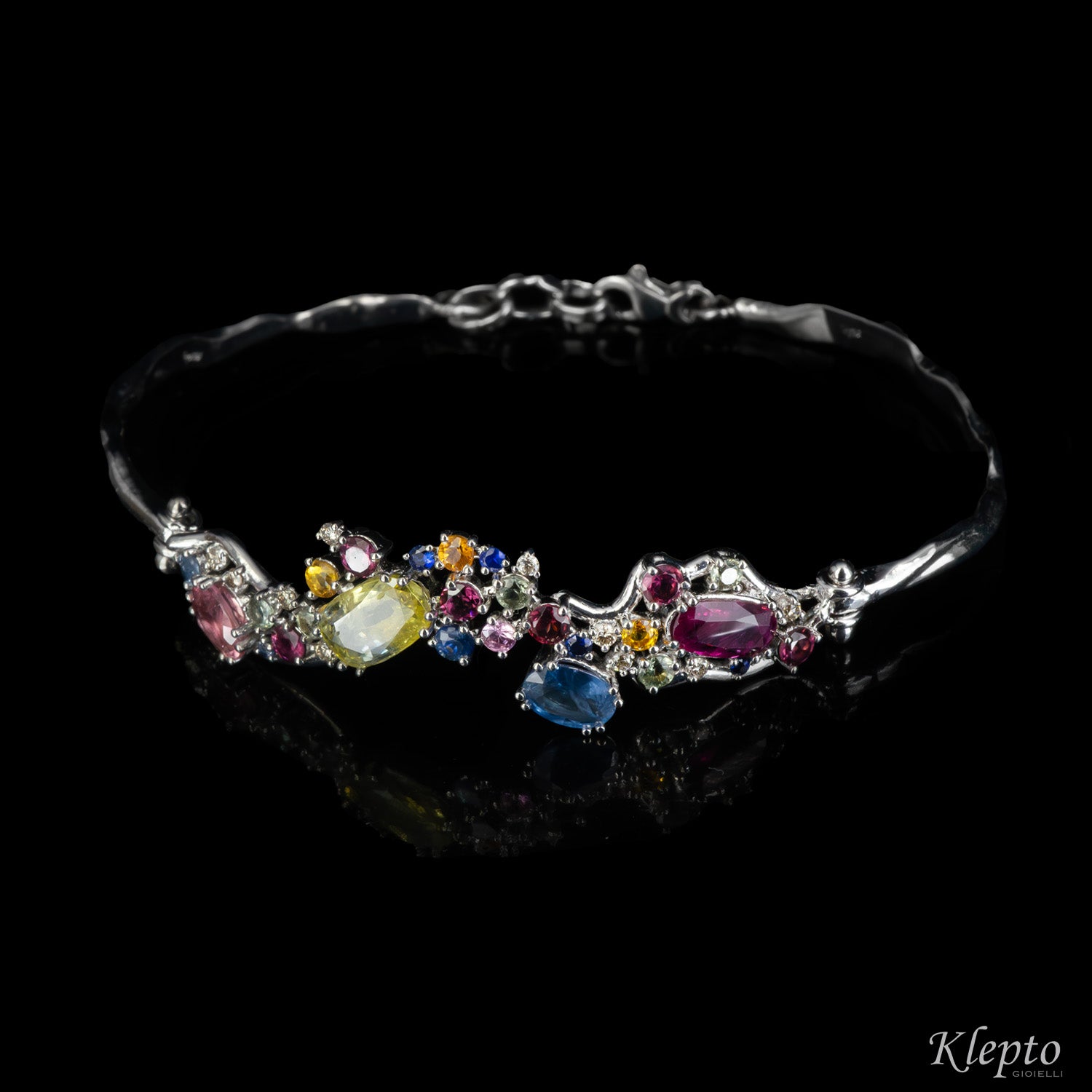 White gold bracelet with Sapphires, Rubies, Diamonds and Rhodolites