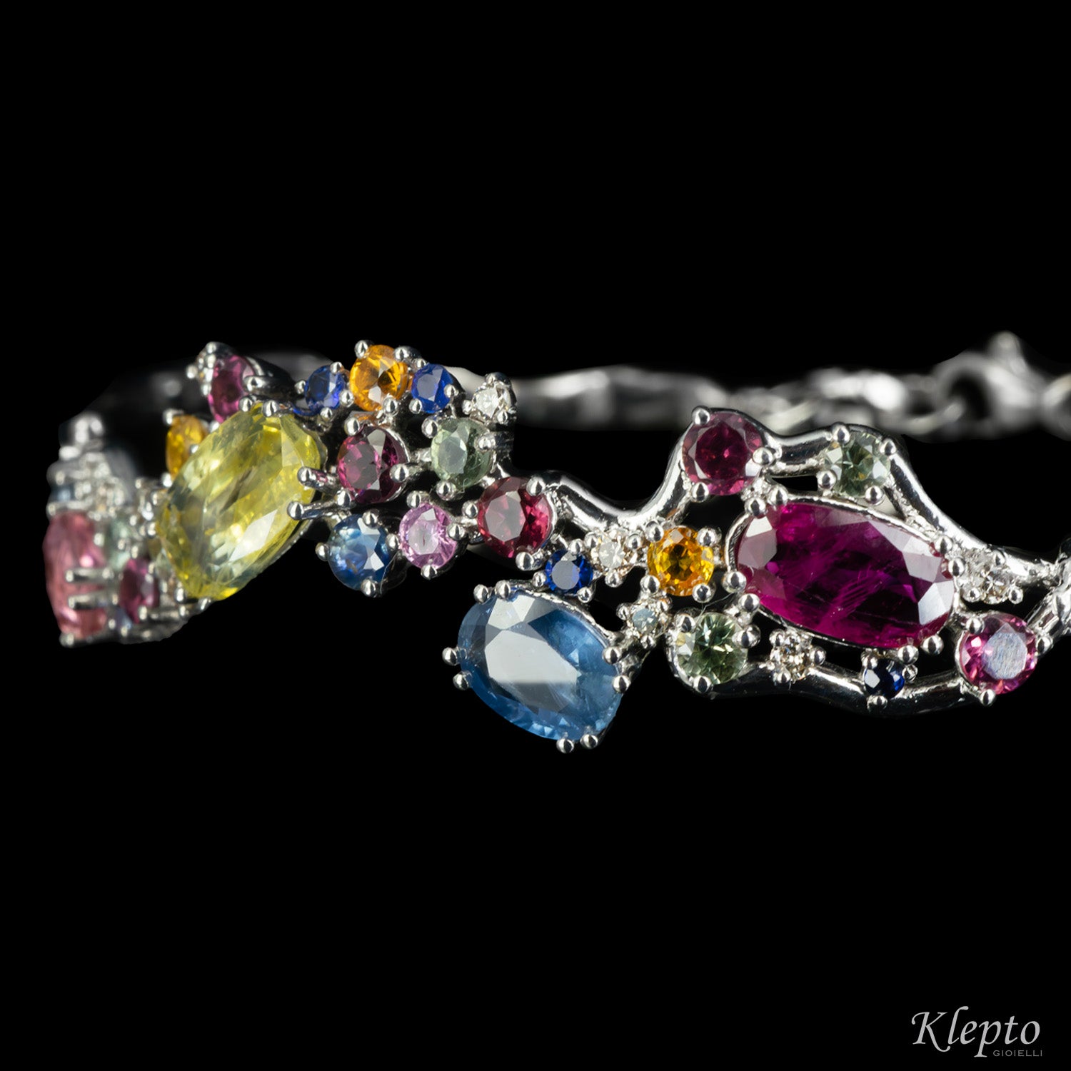 White gold bracelet with Sapphires, Rubies, Diamonds and Rhodolites