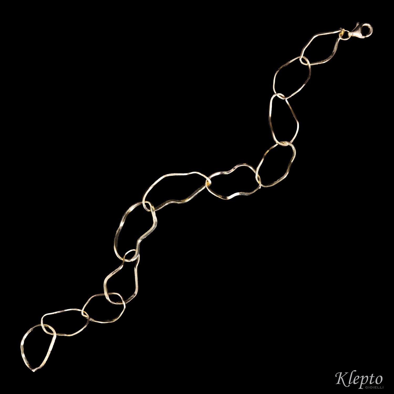 Yellow gold bracelet with irregular rings