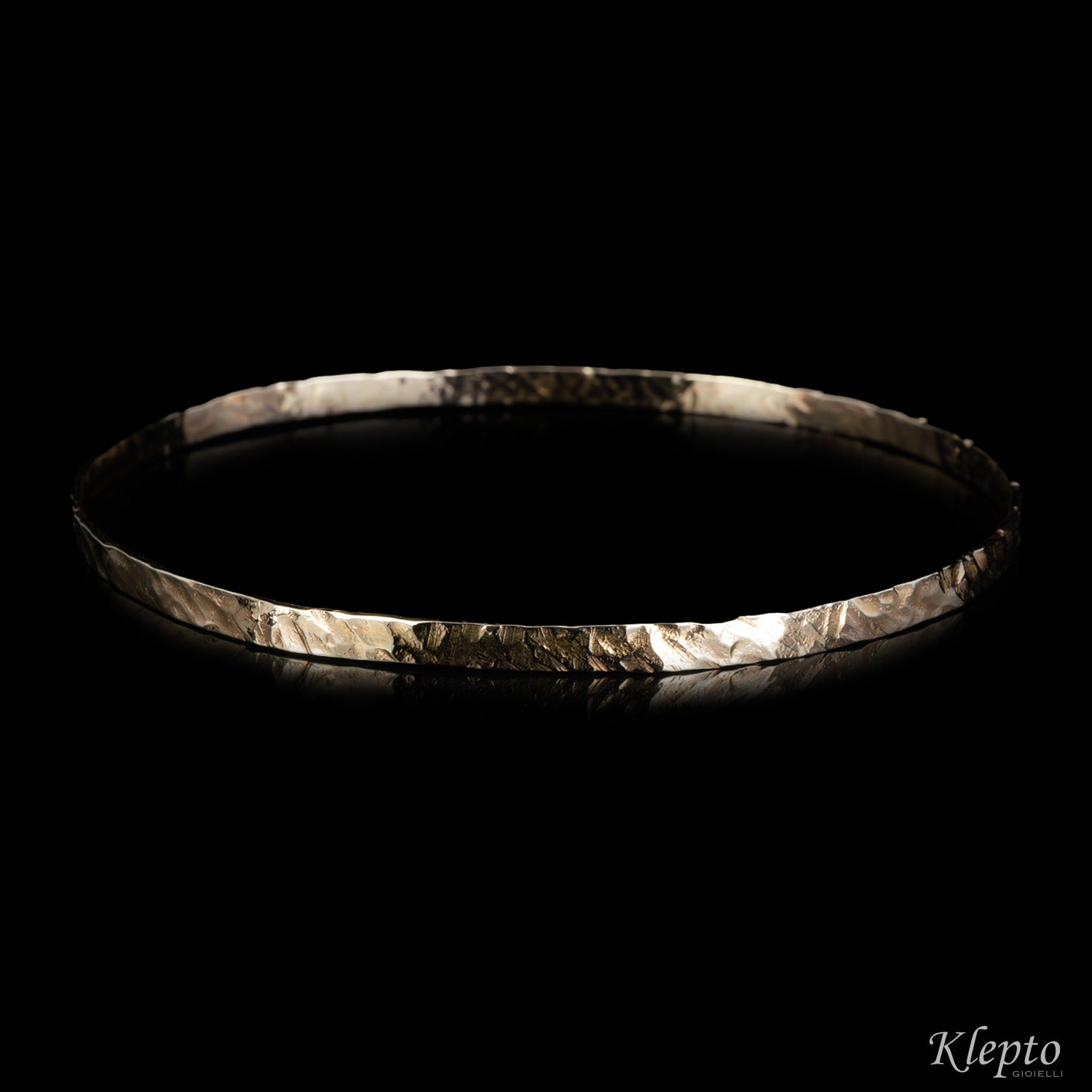 Rigid natural white gold bracelet