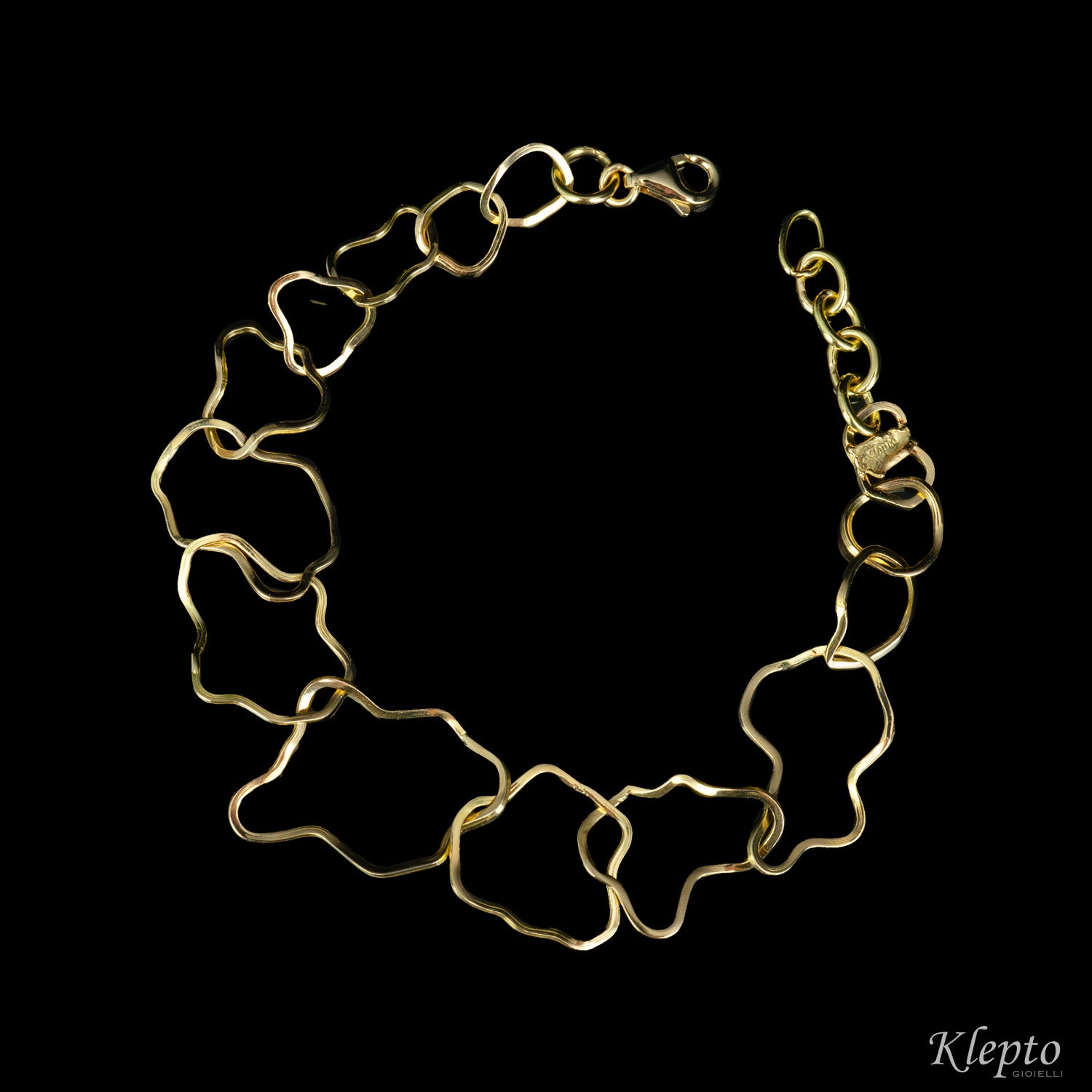 Yellow gold bracelet with irregular rings