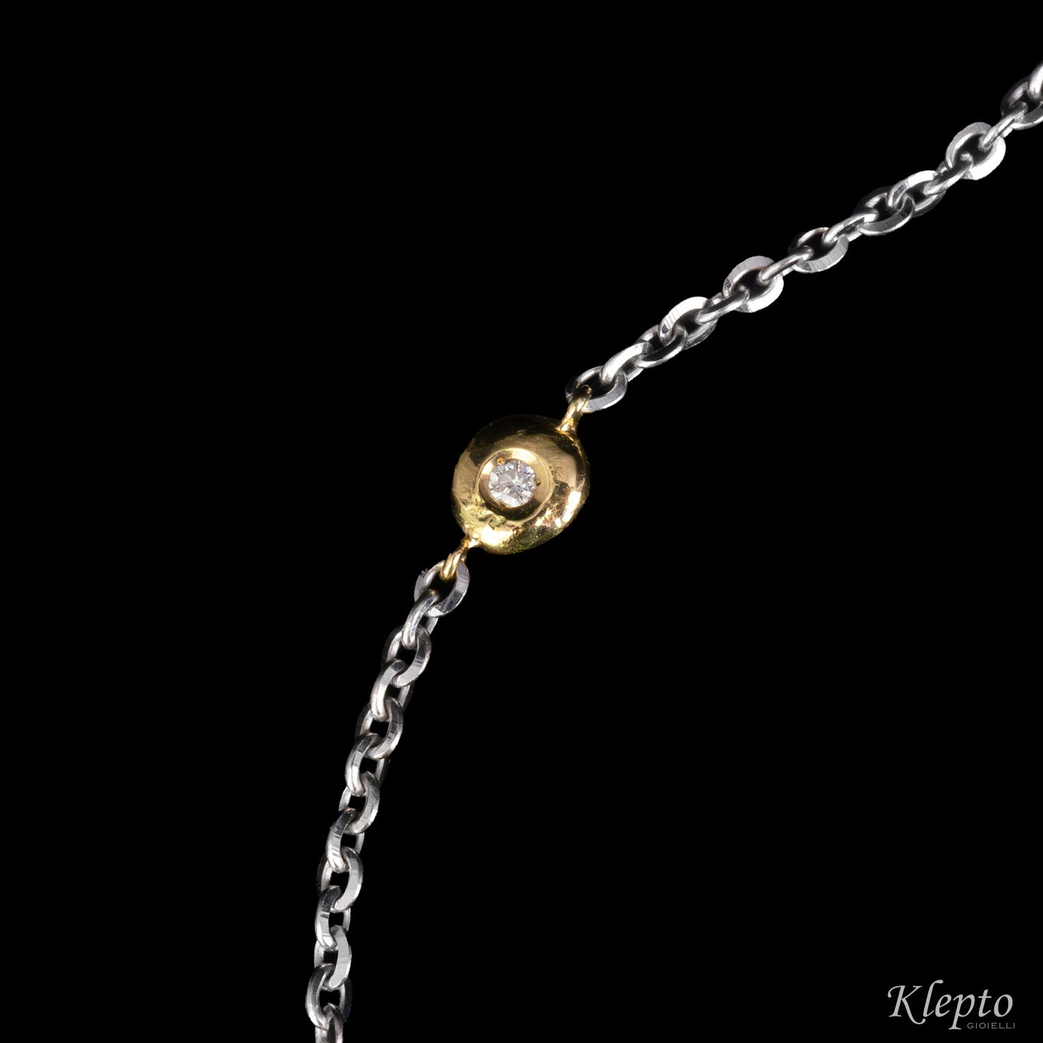 Bracelet in white and yellow gold with "Pepita" diamond