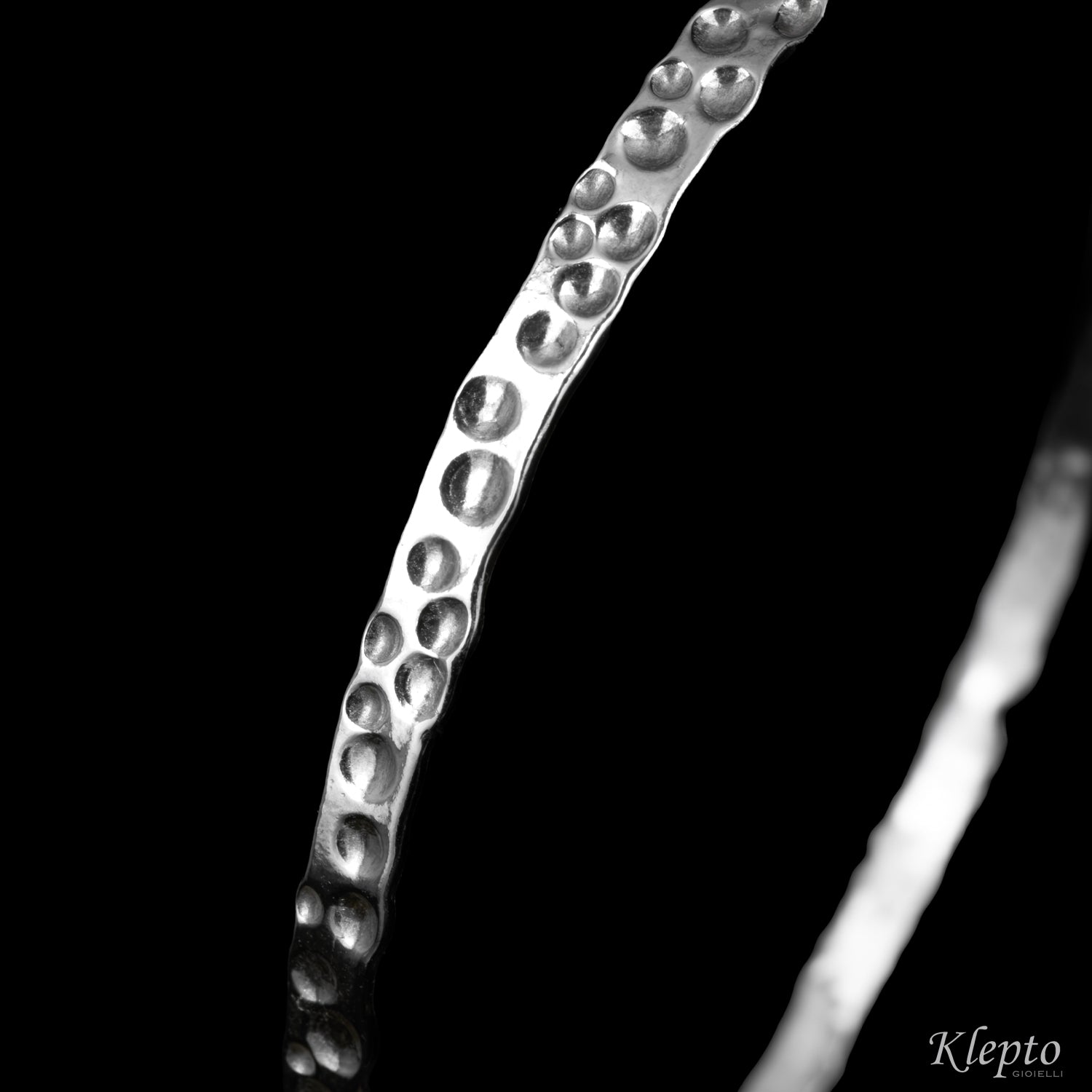 Small hammered rigid Silnova® silver bracelet